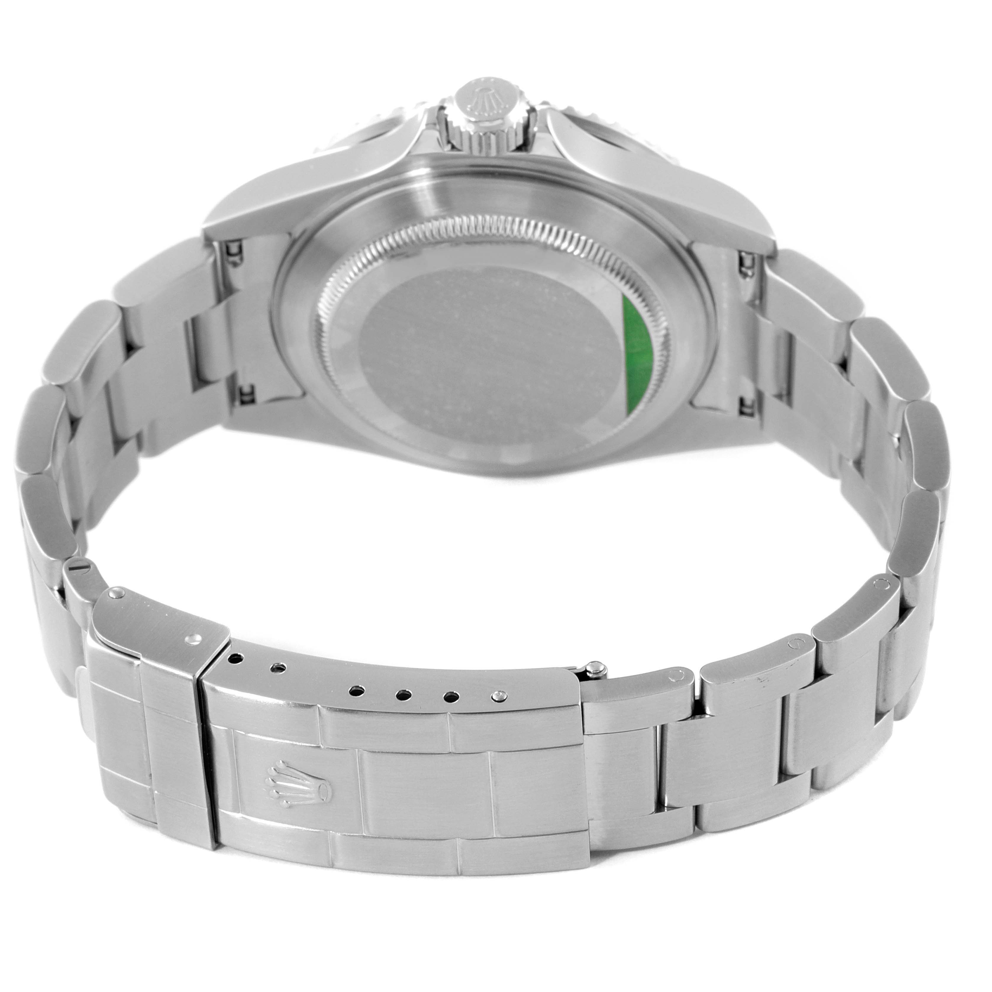 The image shows the back view of a Rolex Submariner 16610 Men
s Stainless Steel Black Dial 16610 Men
s Stainless Steel Black Dial watch, highlighting the case back and stainless steel bracelet.