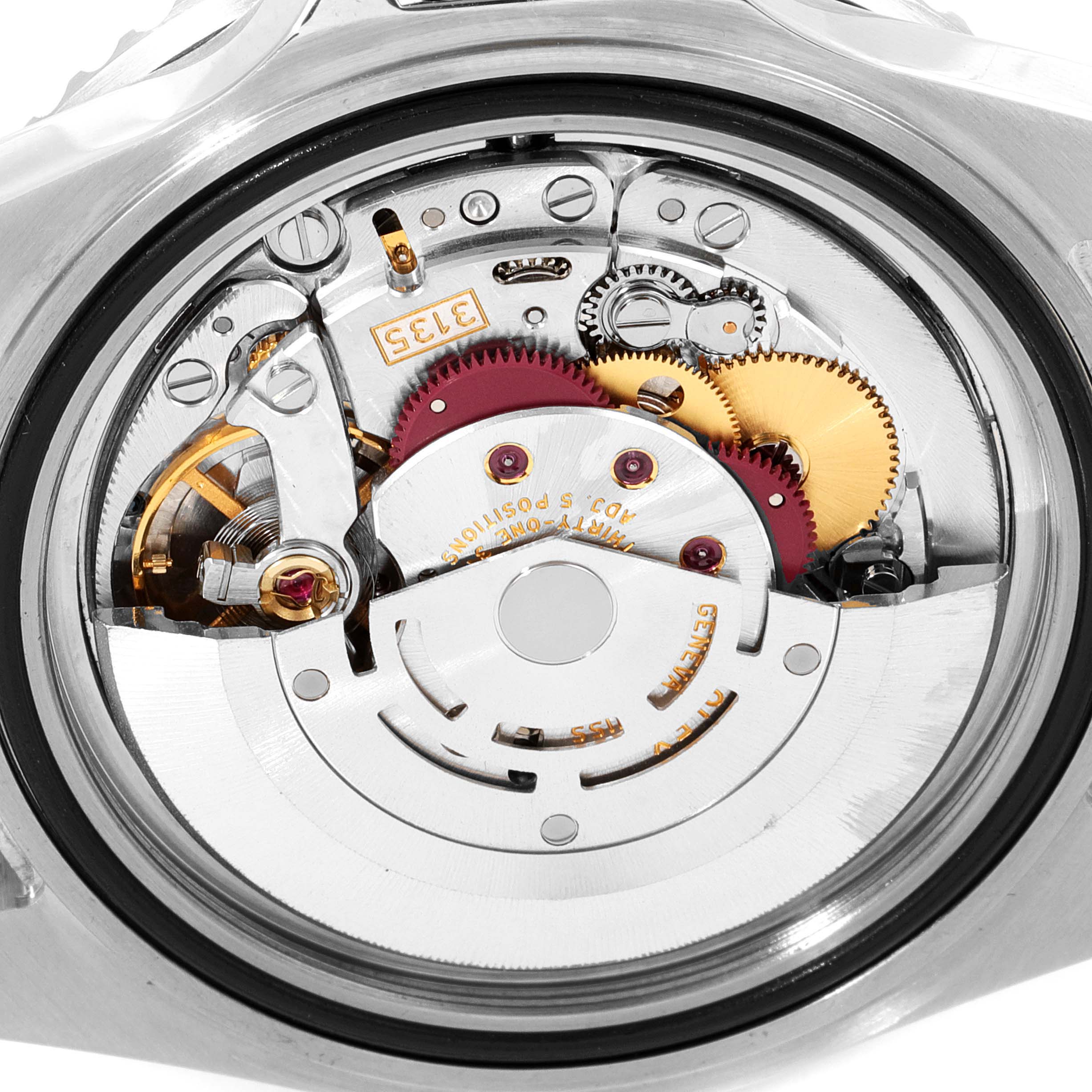 This image shows a close-up view of the movement mechanism inside a Rolex Submariner 16610 Men
s Stainless Steel Black Dial 16610 Men
s Stainless Steel Black Dial watch.