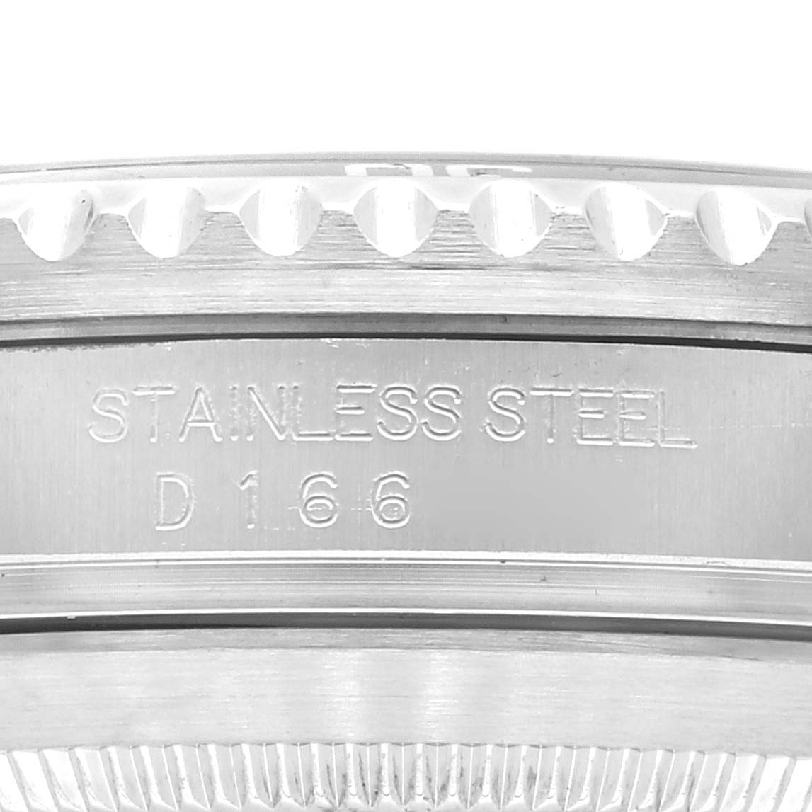 This image shows a close-up view of the stainless steel case back of the Rolex Submariner 16610 Men
s Stainless Steel Black Dial 16610 Men
s Stainless Steel Black Dial watch, highlighting the engravings.