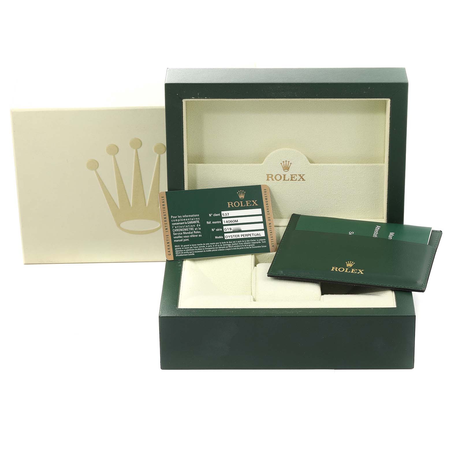 The image shows the packaging and certification accessories for a Rolex Submariner 14060M Men
s Stainless Steel Black Dial 14060M Men
s Stainless Steel Black Dial, including the box, card, and booklet.