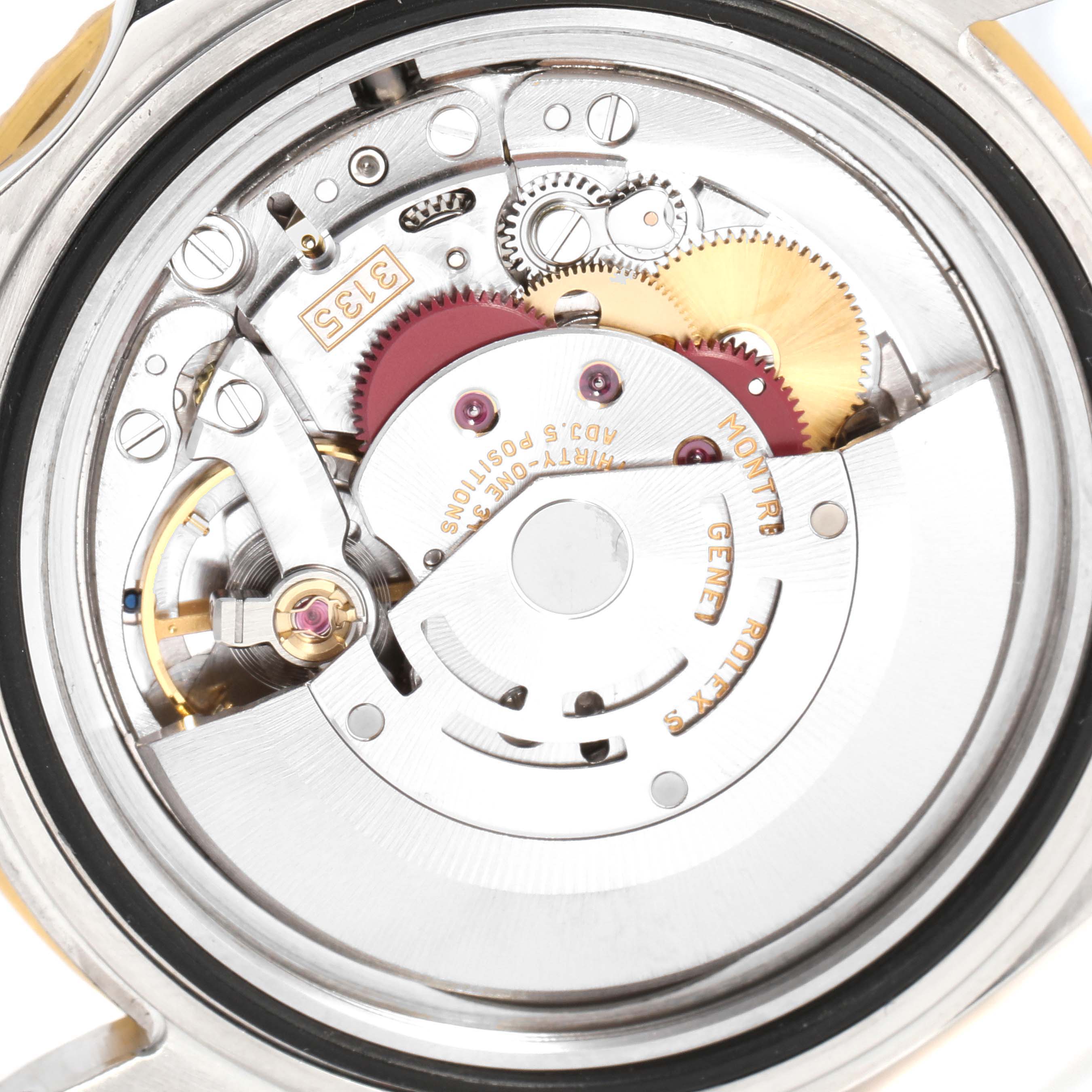 The image shows the internal mechanical movement of a Rolex Submariner 16613 Men
s Steel and Gold (two tone) Champagne Dial 16613 Men
s Steel and Gold (two tone) Champagne Dial watch from a top-down perspective.