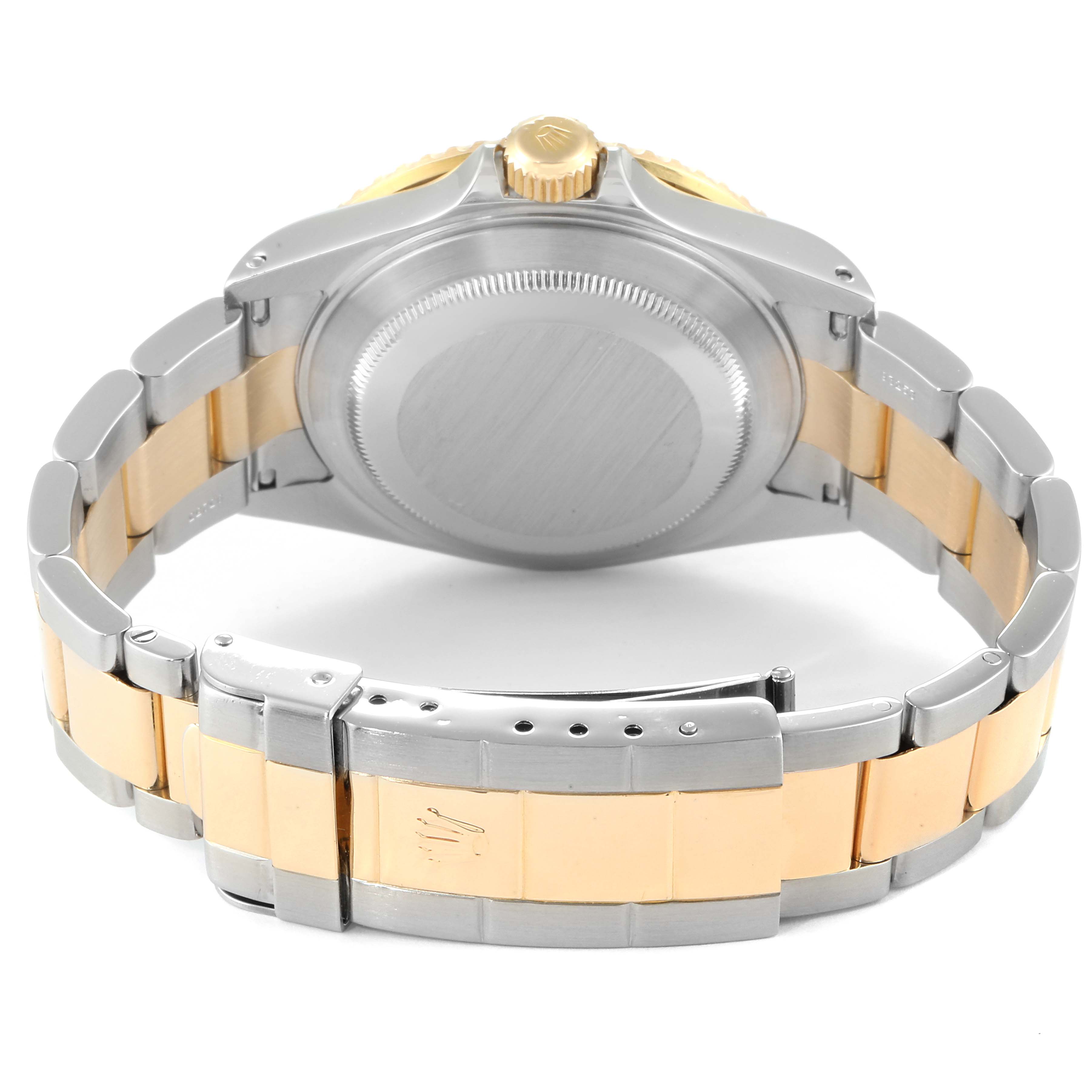 The image shows the back case and clasp of a Rolex Submariner 16613 Men
s Steel and Gold (two tone) Champagne Dial 16613 Men
s Steel and Gold (two tone) Champagne Dial watch, highlighting the bracelet and crown at the top.