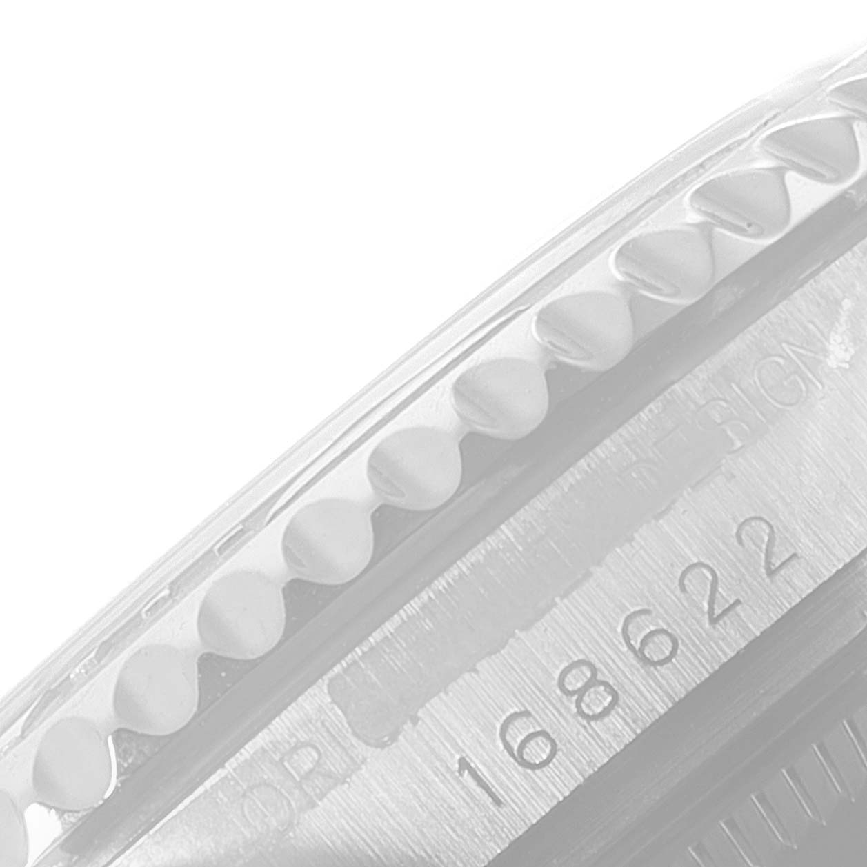 This image shows a close-up view of the bezel and part of the case with engraved text on a Rolex Yacht-Master 168622 Men's Stainless Steel Silver Dial 168622 Men's Stainless Steel Silver Dial watch.