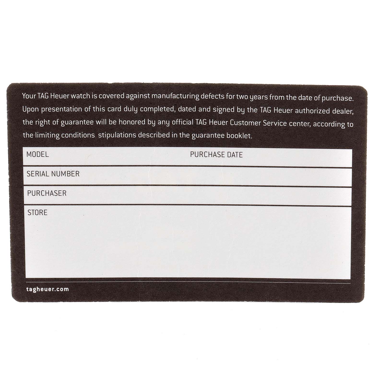 The image shows the guarantee card for a Formula 1 model by Tag Heuer, laying flat.