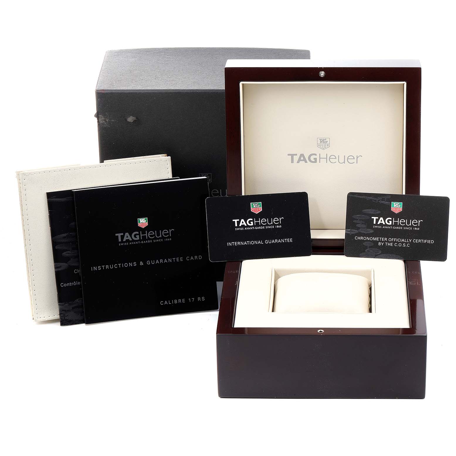 The image shows the Tag Heuer Carrera CAV511B Men's Stainless Steel Silver Dial CAV511B Men's Stainless Steel Silver Dial watch accessories including the box, international guarantee card, and instructions booklet.