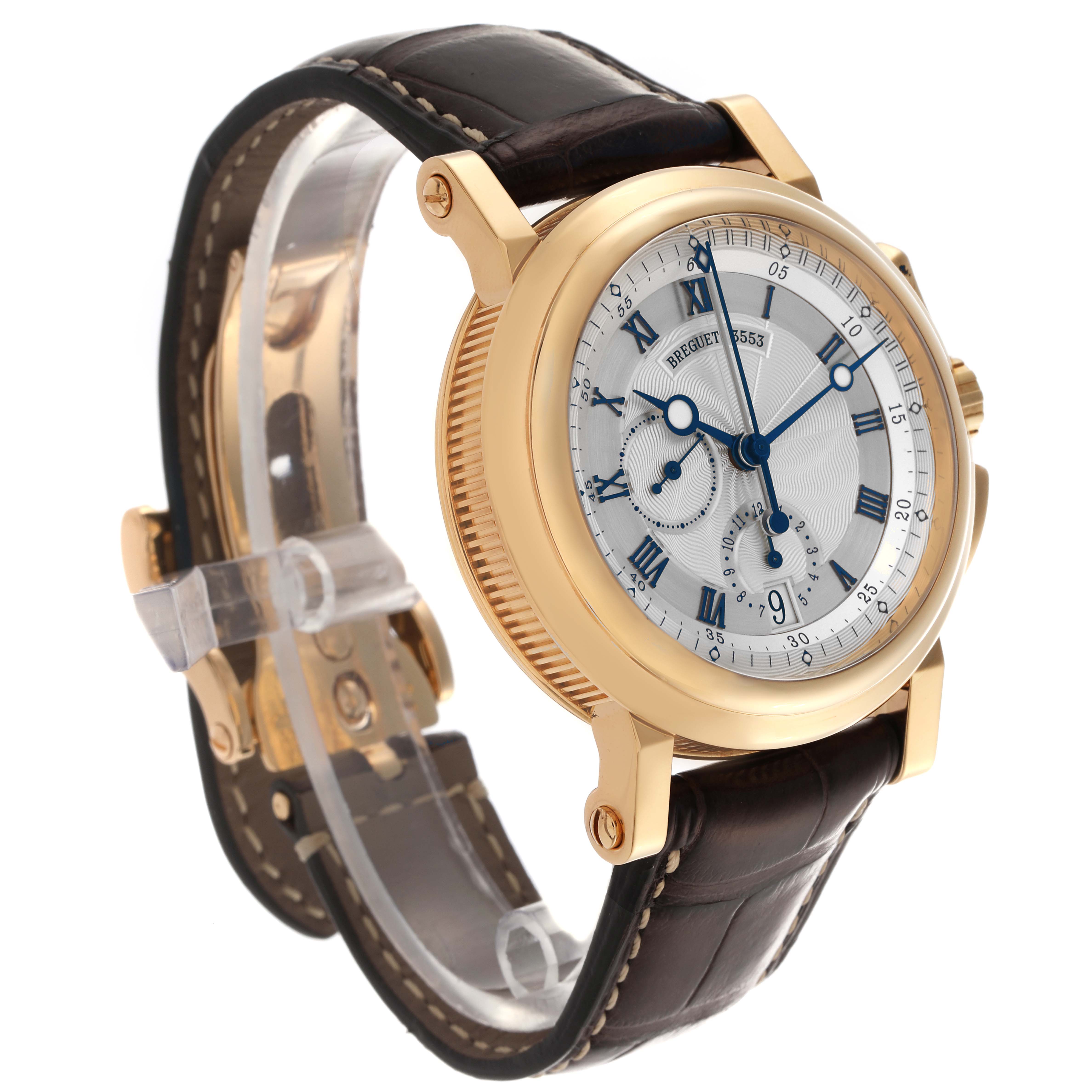 The Breguet Marine 5827BA/12/9Z8 Men's Yellow Gold Silver Dial 5827BA/12/9Z8 Men's Yellow Gold Silver Dial watch is shown at an angle highlighting the gold case, dial, and leather strap.