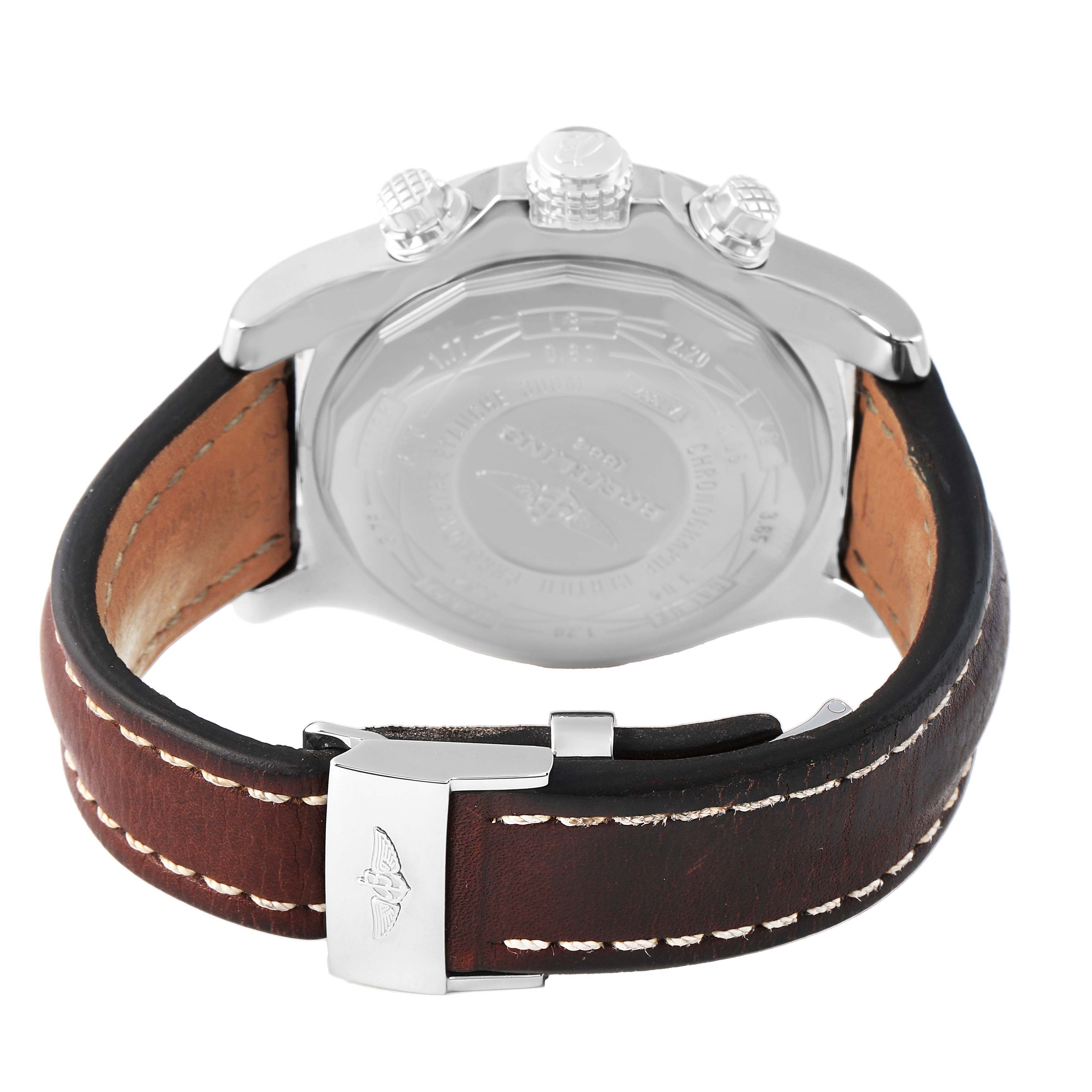 The Breitling Avenger A13371 Men's Stainless Steel White Dial watch is shown from the back, highlighting its case back, crown, pushers, and leather strap with clasp.