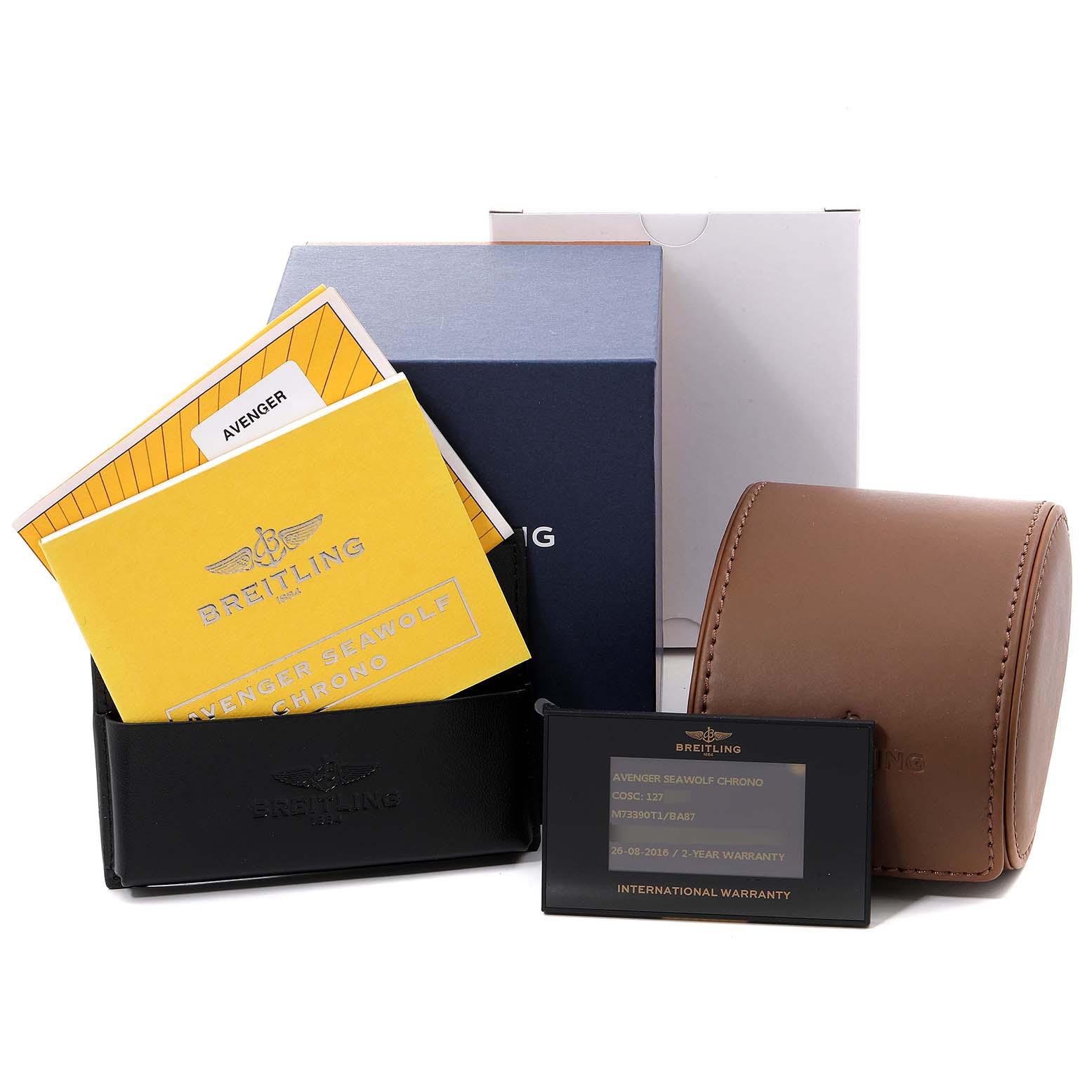 The image shows the Avenger model by Breitling with its box, warranty card, manuals, and a brown watch case.