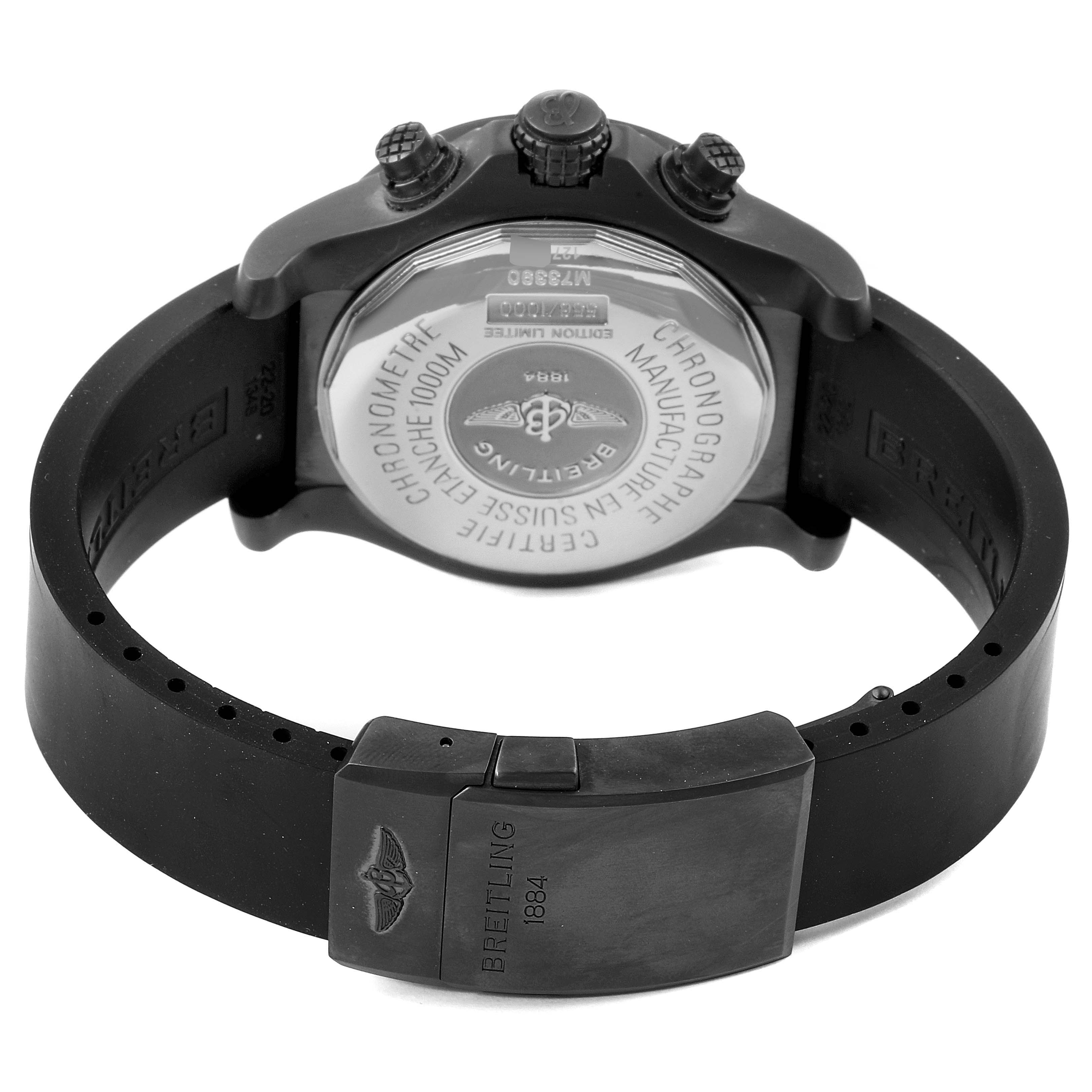 This image shows the back view of a Breitling Avenger M73390 Men's Stainless Steel Black Dial M73390 Men's Stainless Steel Black Dial watch, including its case back, crown, pushers, and rubber strap with clasp.