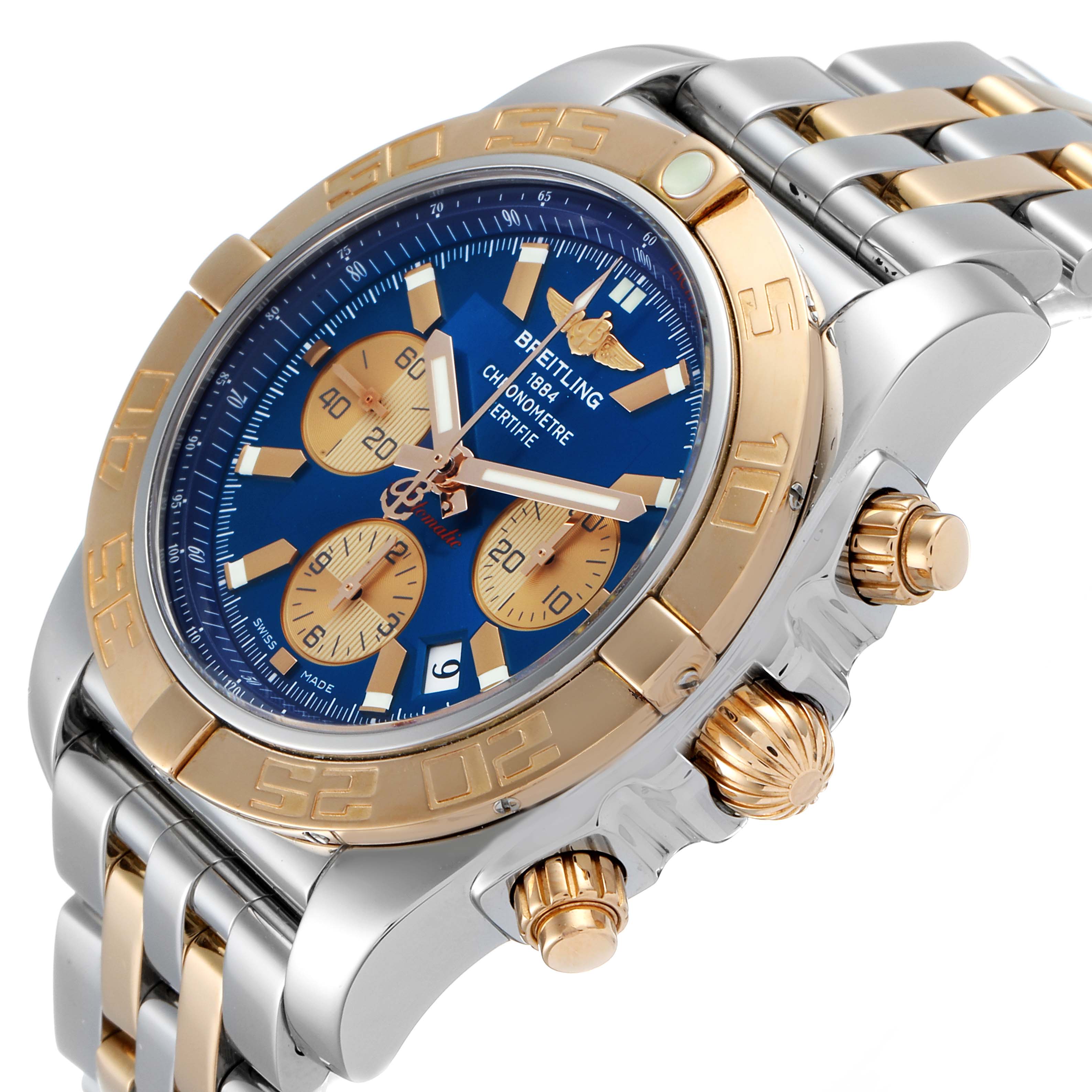 The image shows a close-up angled view of a Breitling Chronomat CB011012/C790 Men's Steel and Gold (two tone) Blue Dial CB011012/C790 Men's Steel and Gold (two tone) Blue Dial watch, highlighting its bezel, dial, sub-dials, and pushers.