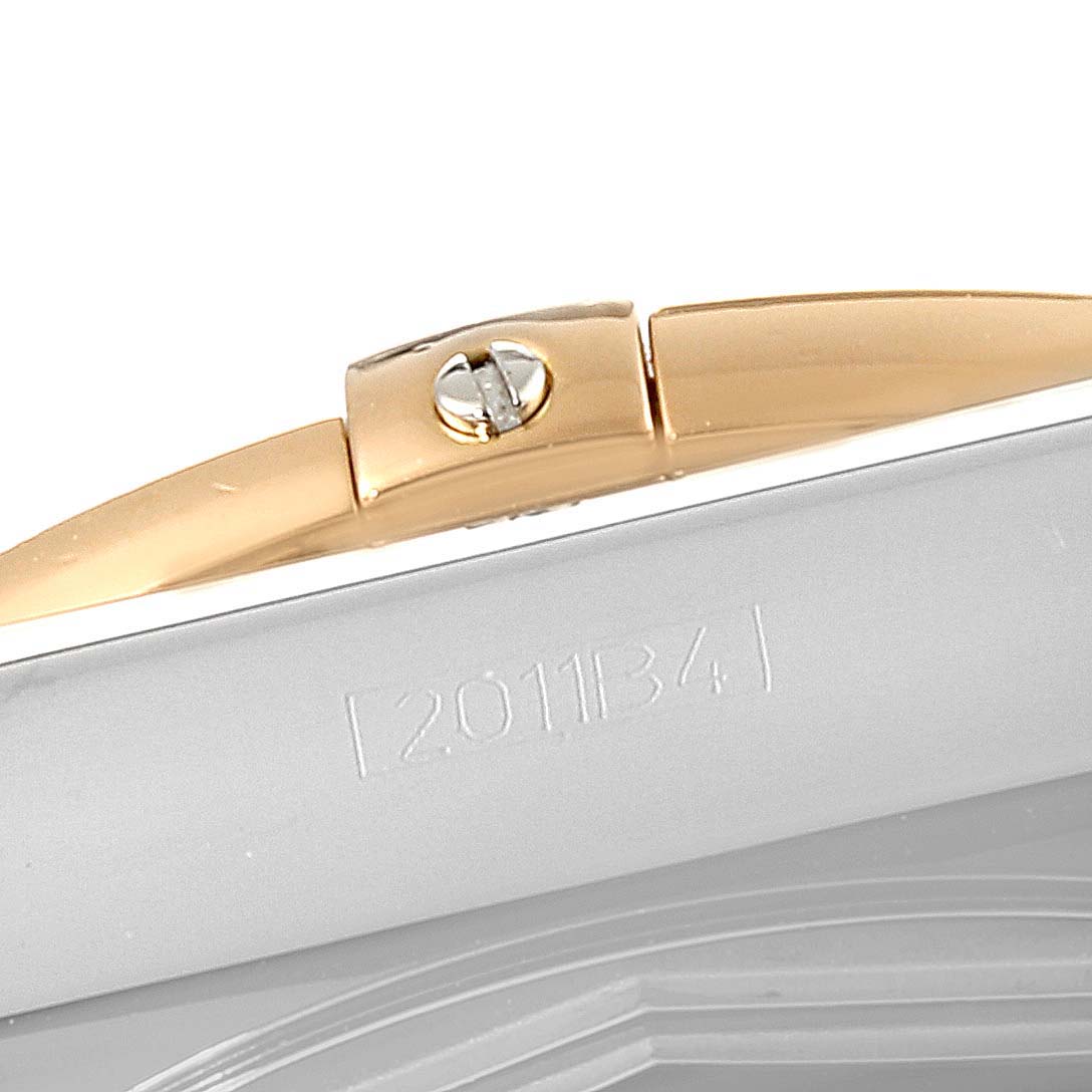 The image shows a close-up of the side of a Breitling Chronomat CB011012/C790 Men's Steel and Gold (two tone) Blue Dial CB011012/C790 Men's Steel and Gold (two tone) Blue Dial watch, focusing on the case and a gold-tone screw detail.