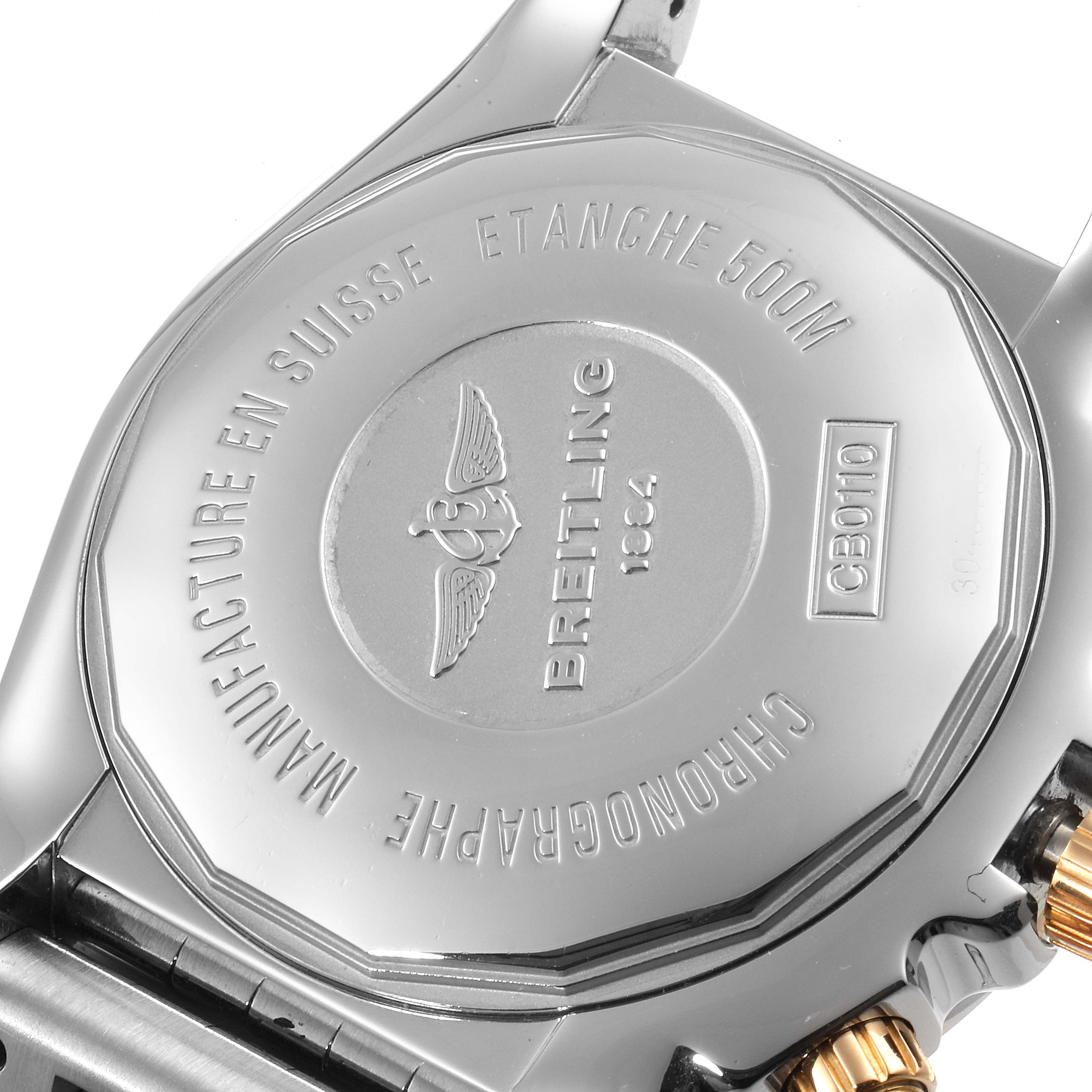 This image shows the case back of a Breitling Chronomat CB011012/C790 Men's Steel and Gold (two tone) Blue Dial CB011012/C790 Men's Steel and Gold (two tone) Blue Dial watch, featuring engravings and the brand logo.