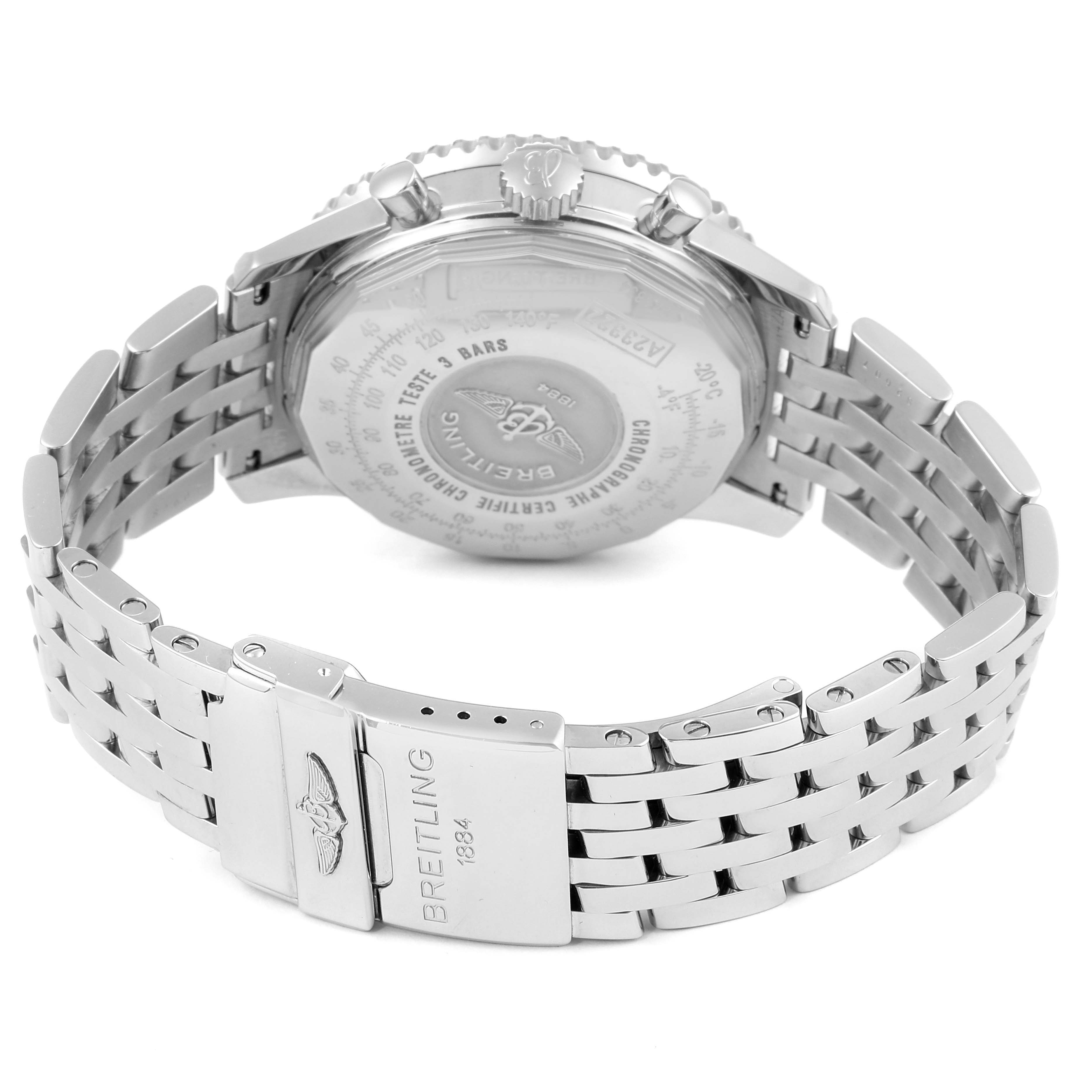 This image shows the back case and metal bracelet of a Navitimer model by Breitling, highlighting the clasp and engravings.