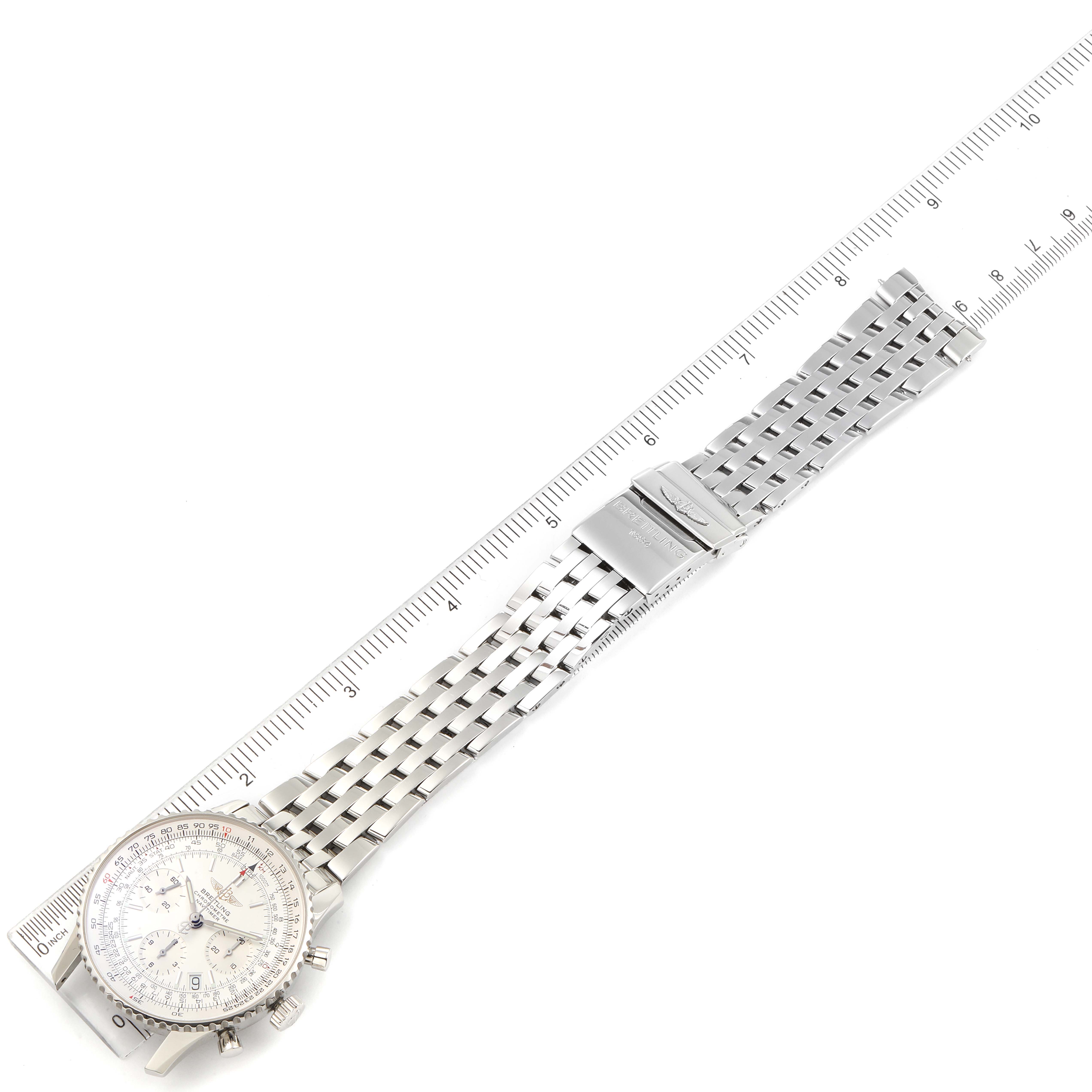 The image shows a top-down view of a Breitling Navitimer A23322 Men's Stainless Steel Silver Dial A23322 Men's Stainless Steel Silver Dial watch, displaying the watch face and metal bracelet next to a ruler.