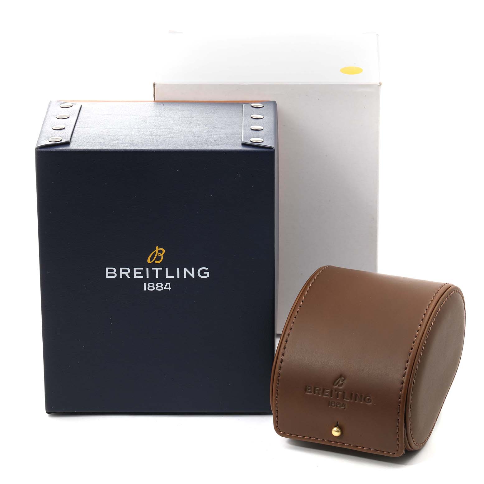 This image shows a Breitling Navitimer A23322 Men's Stainless Steel Silver Dial A23322 Men's Stainless Steel Silver Dial watch case and its accessories at an angled side view.