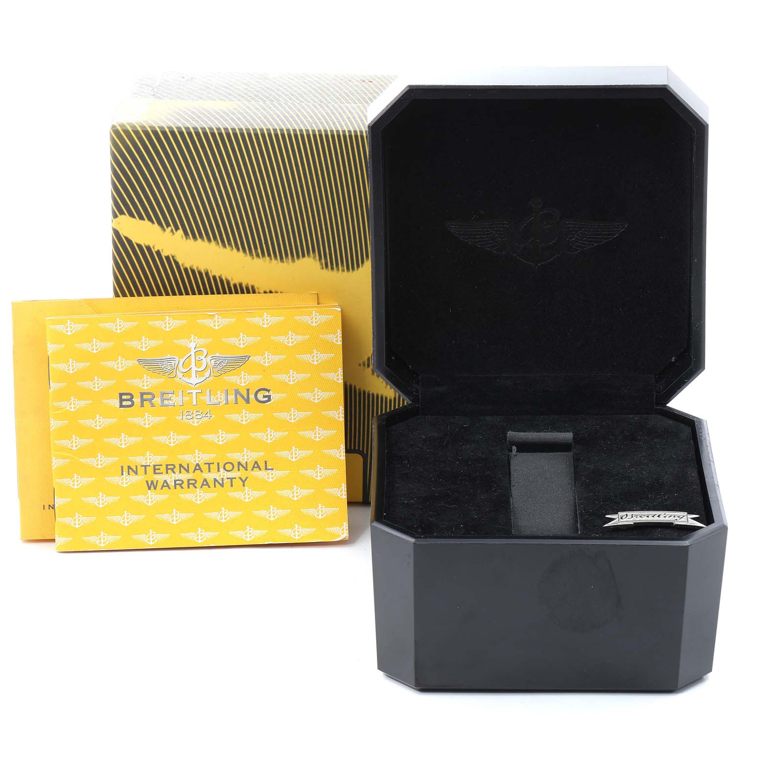 This image shows a Breitling Navitimer A13330 Men's Stainless Steel Black Dial A13330 Men's Stainless Steel Black Dial watch box, international warranty card, and outer packaging.
