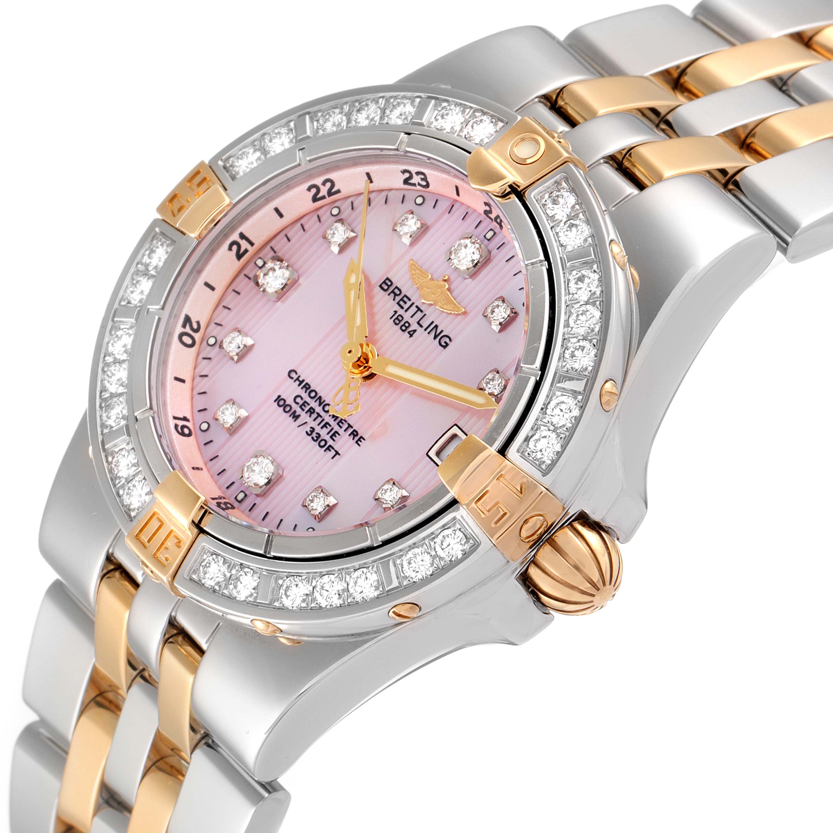 The Breitling B71340 Women's Steel and Gold (two tone) Mother of Pearl Dial B71340 Women's Steel and Gold (two tone) Mother of Pearl Dial Starliner Steel Yellow Gold MOP Diamond Ladies Watch B71340 is shown from a close-up angle, highlighting the dial, bezel, and part of the bracelet.