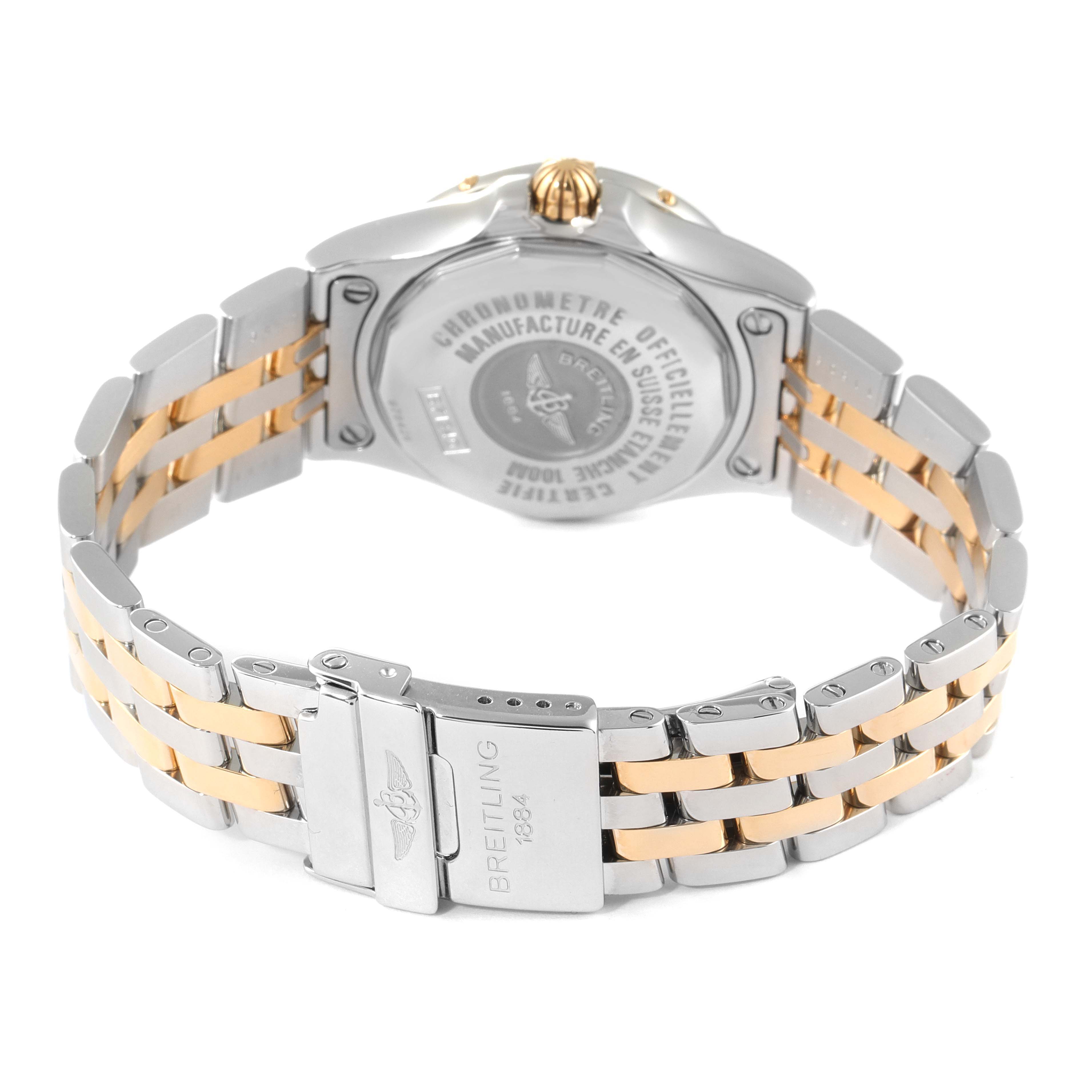 The image shows the back of the Breitling B71340 Women's Steel and Gold (two tone) Mother of Pearl Dial B71340 Women's Steel and Gold (two tone) Mother of Pearl Dial Starliner Steel Yellow Gold MOP Diamond Ladies Watch B71340, highlighting its clasp and bracelet.