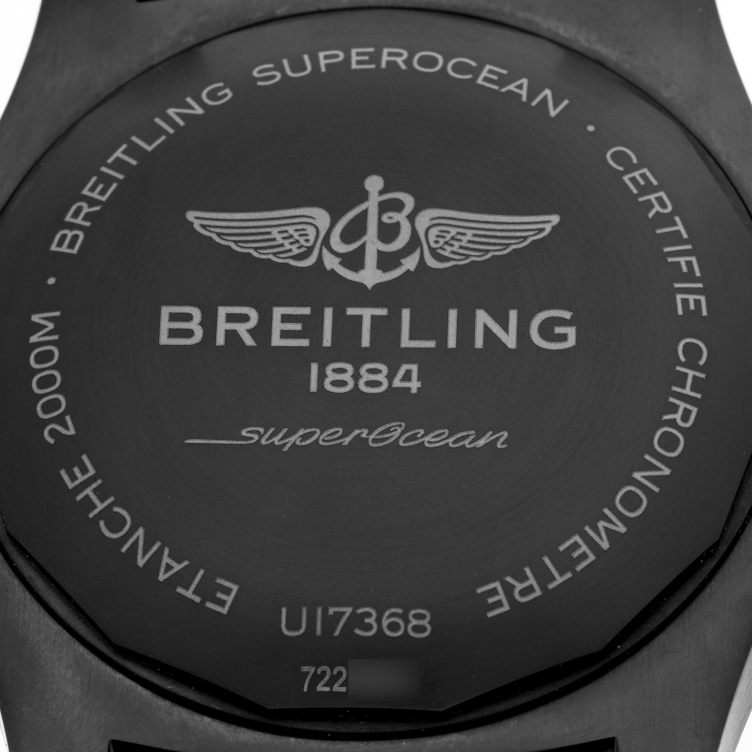 The image shows the back case of a Breitling Superocean U17368 Men's Steel and Gold (two tone) Black Dial U17368 Men's Steel and Gold (two tone) Black Dial watch, highlighting the brand logo and model details.