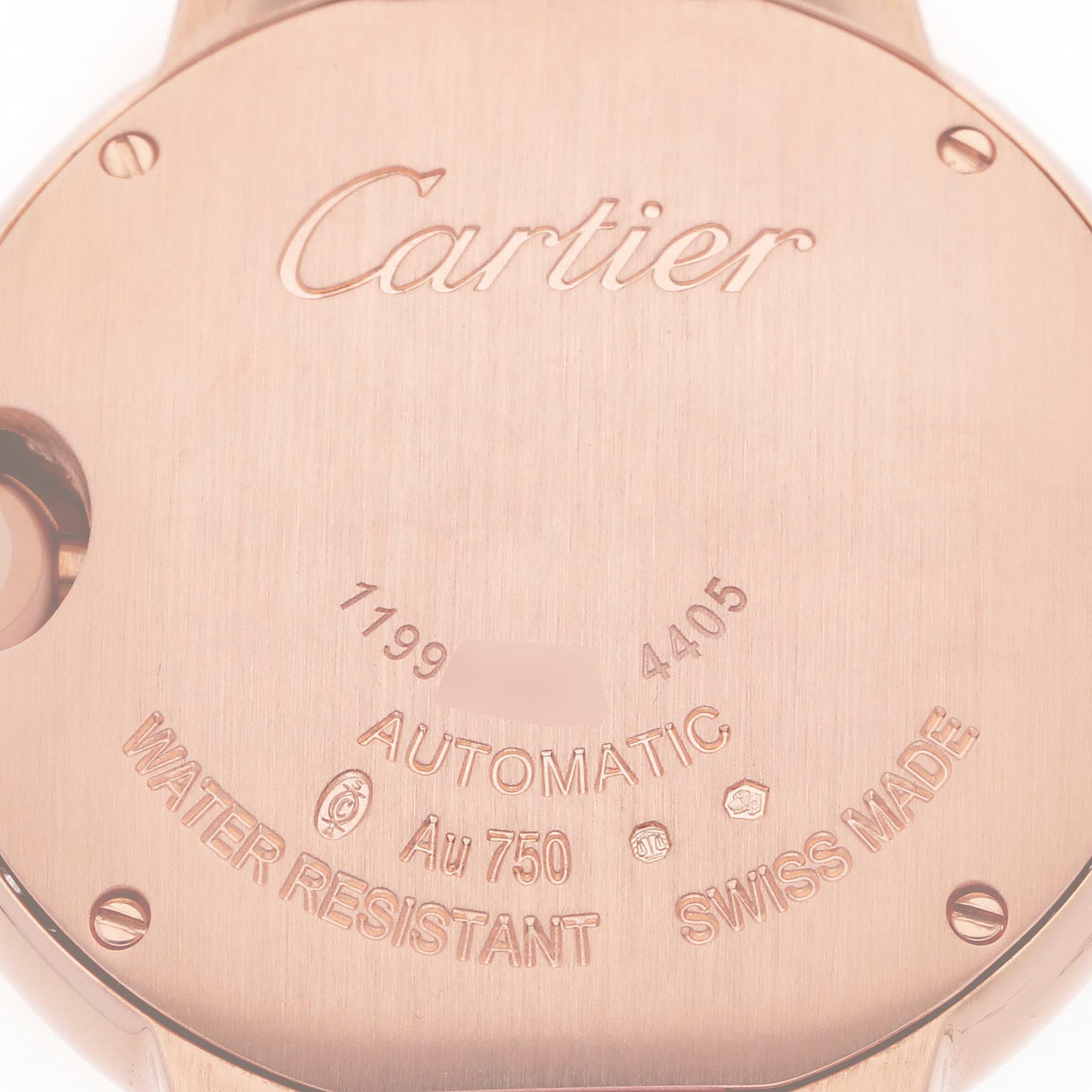 The image shows the back case of a Cartier Ballon Bleu WJBB0076 Women's Rose Gold Pink Dial watch, highlighting its engraved details.
