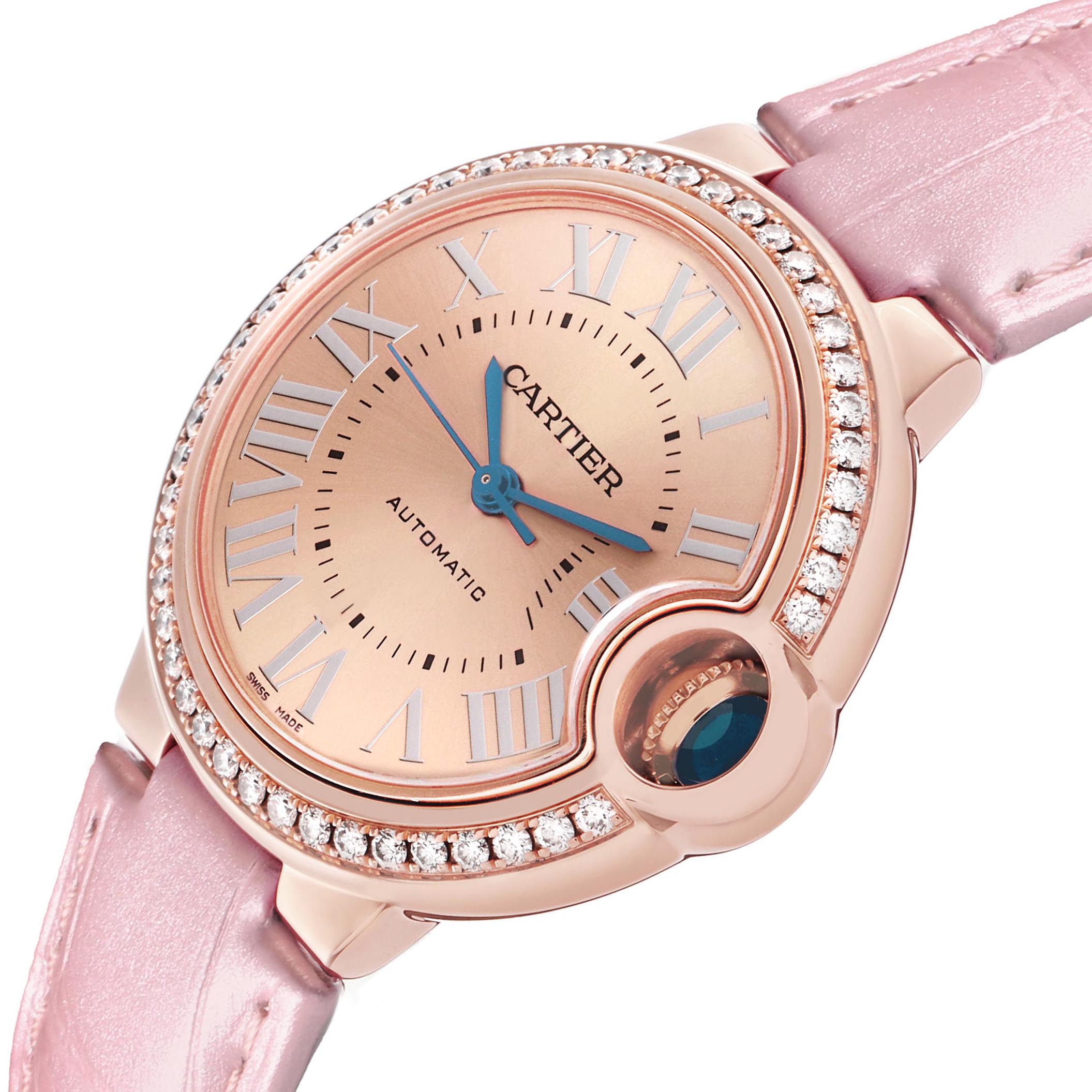 This Cartier Ballon Bleu WJBB0076 Women's Rose Gold Pink Dial watch is shown at a slight angle, highlighting its rose gold face, diamond bezel, and pink strap.