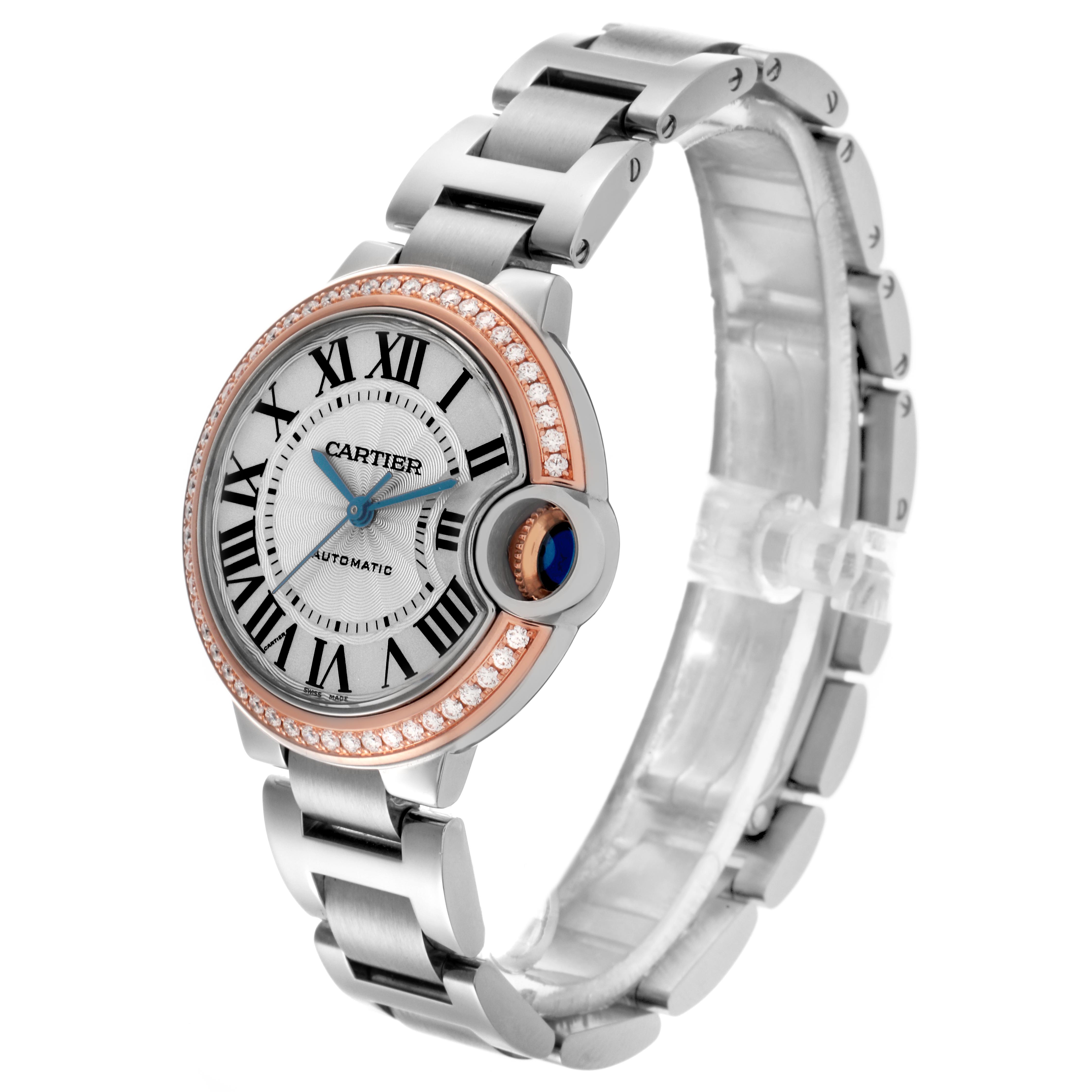 The Cartier Ballon Bleu WE902080 Women's Steel and Gold (two tone) Silver Dial WE902080 Women's Steel and Gold (two tone) Silver Dial watch is shown from a front-side angle, displaying the face, bezel with diamonds, and stainless steel bracelet.