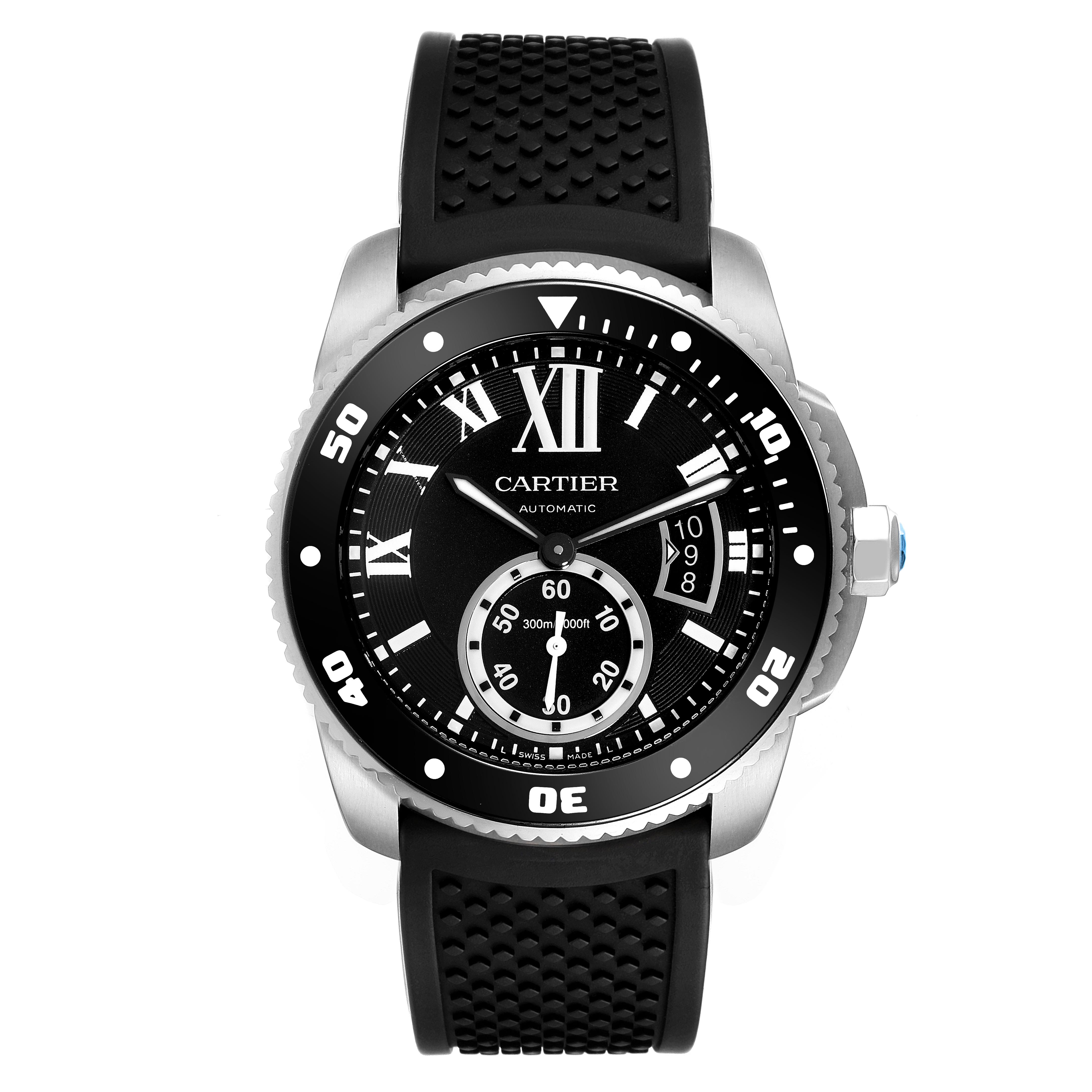 The image shows a front view of the Calibre de Cartier watch by Cartier, featuring its dial, bezel, and rubber strap.