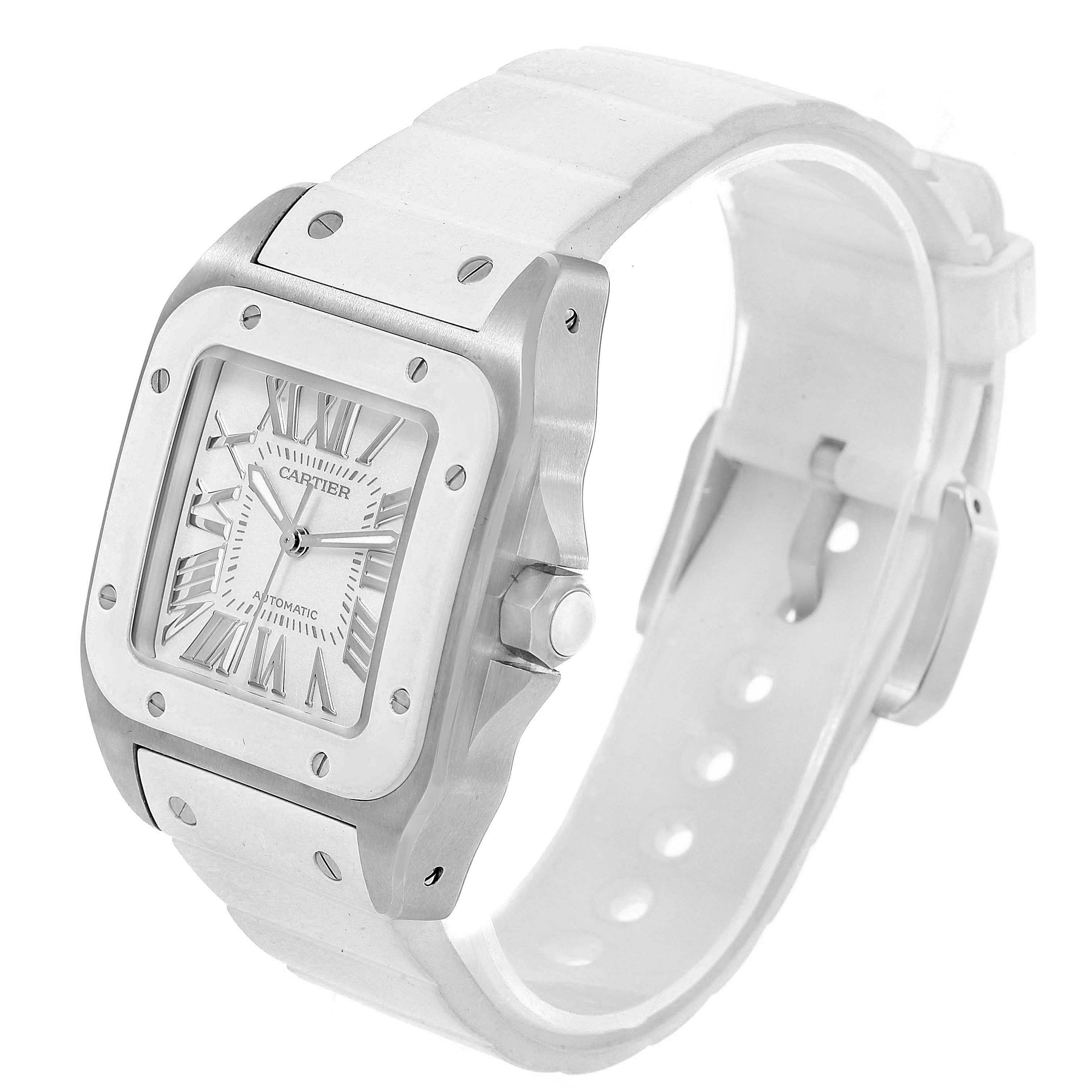 The image shows a front and side view of the Cartier Santos W20129U2 Men
s Stainless Steel Silver Dial W20129U2 Men
s Stainless Steel Silver Dial watch, highlighting its dial, bezel, and white strap.