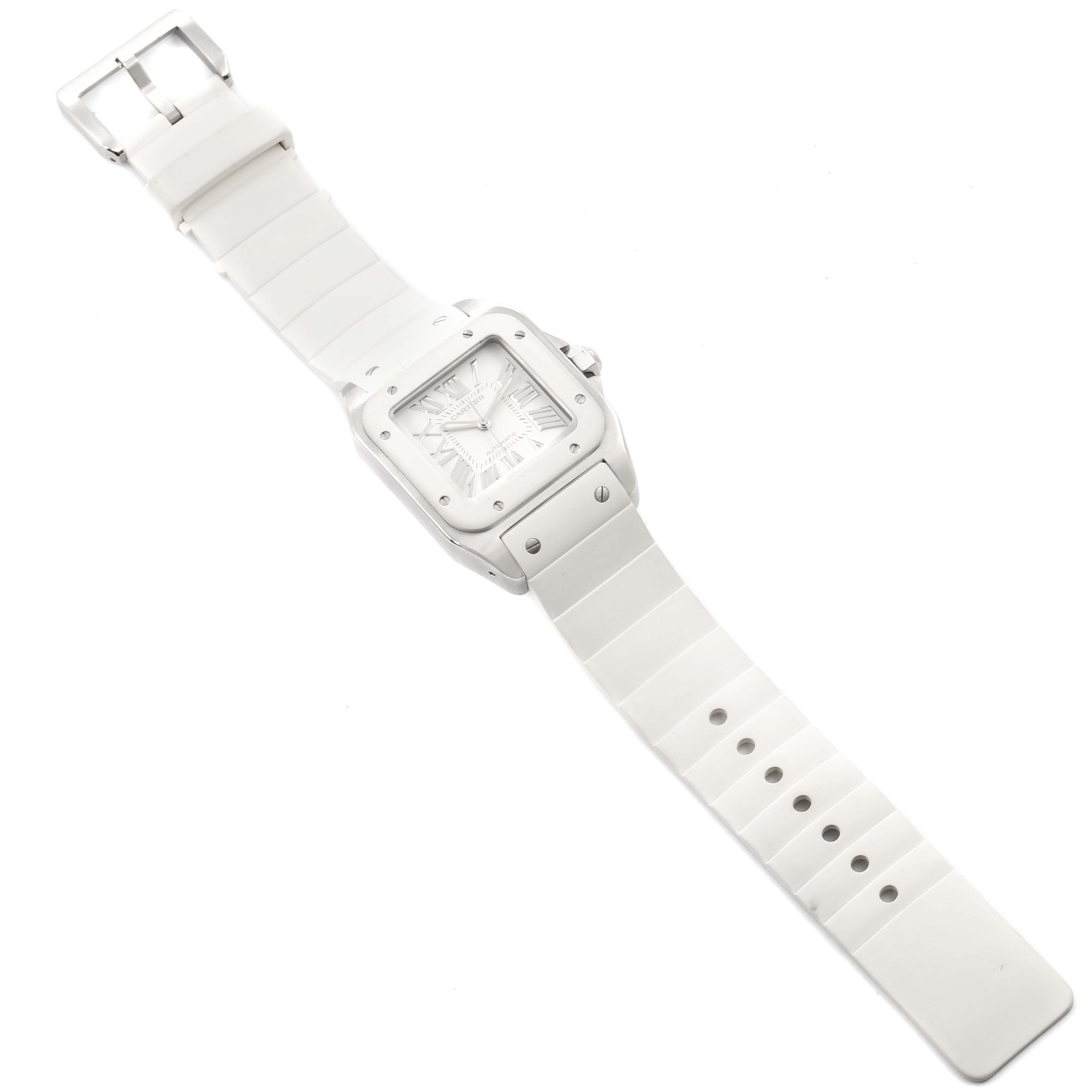 This image shows a top-down view of the Cartier Santos W20129U2 Men
s Stainless Steel Silver Dial W20129U2 Men
s Stainless Steel Silver Dial watch, highlighting its white dial and white strap.