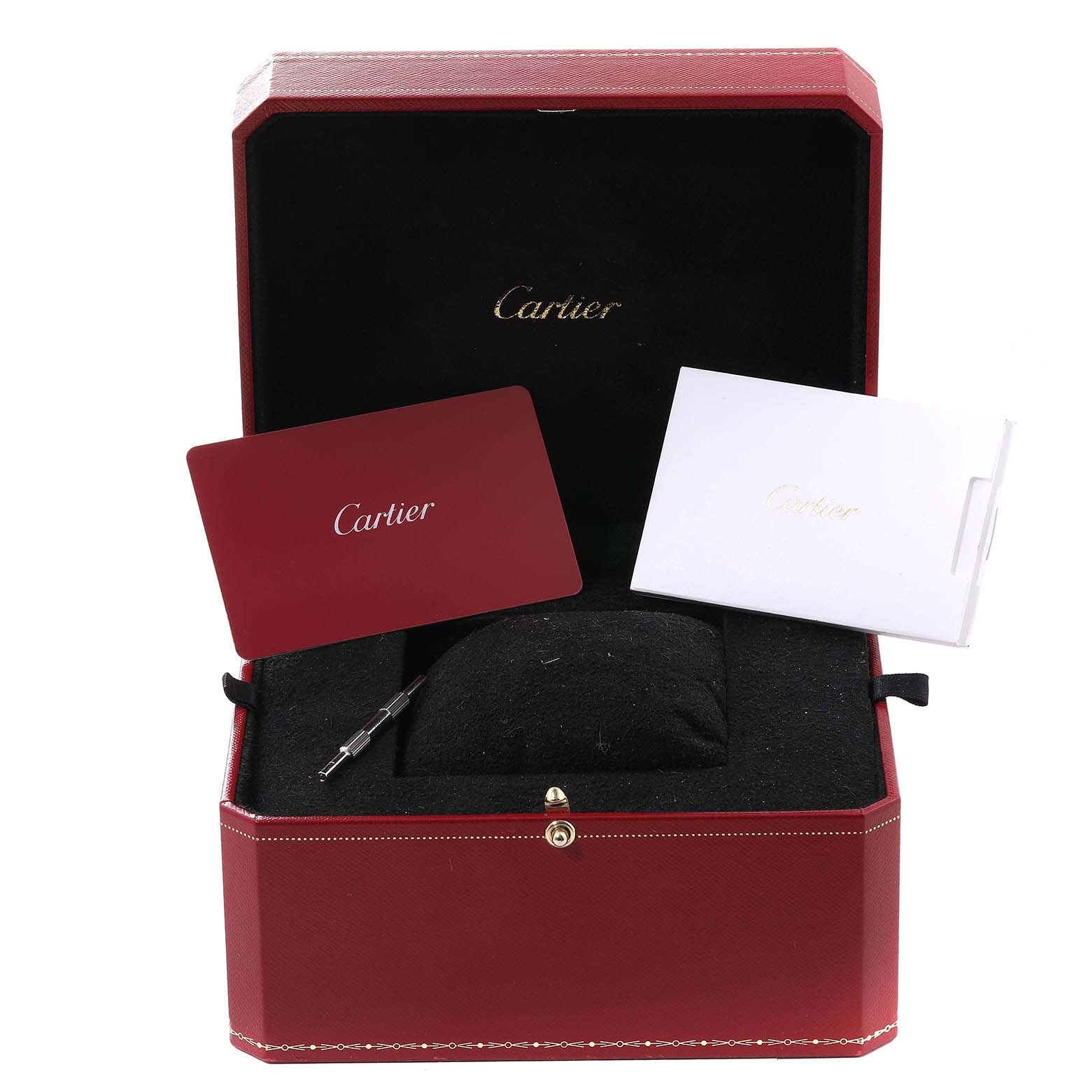 The image shows an open Cartier Santos WSSA0030 Men's Stainless Steel Blue Dial WSSA0030 Men's Stainless Steel Blue Dial watch box with a pillow, warranty cards, and a tool.