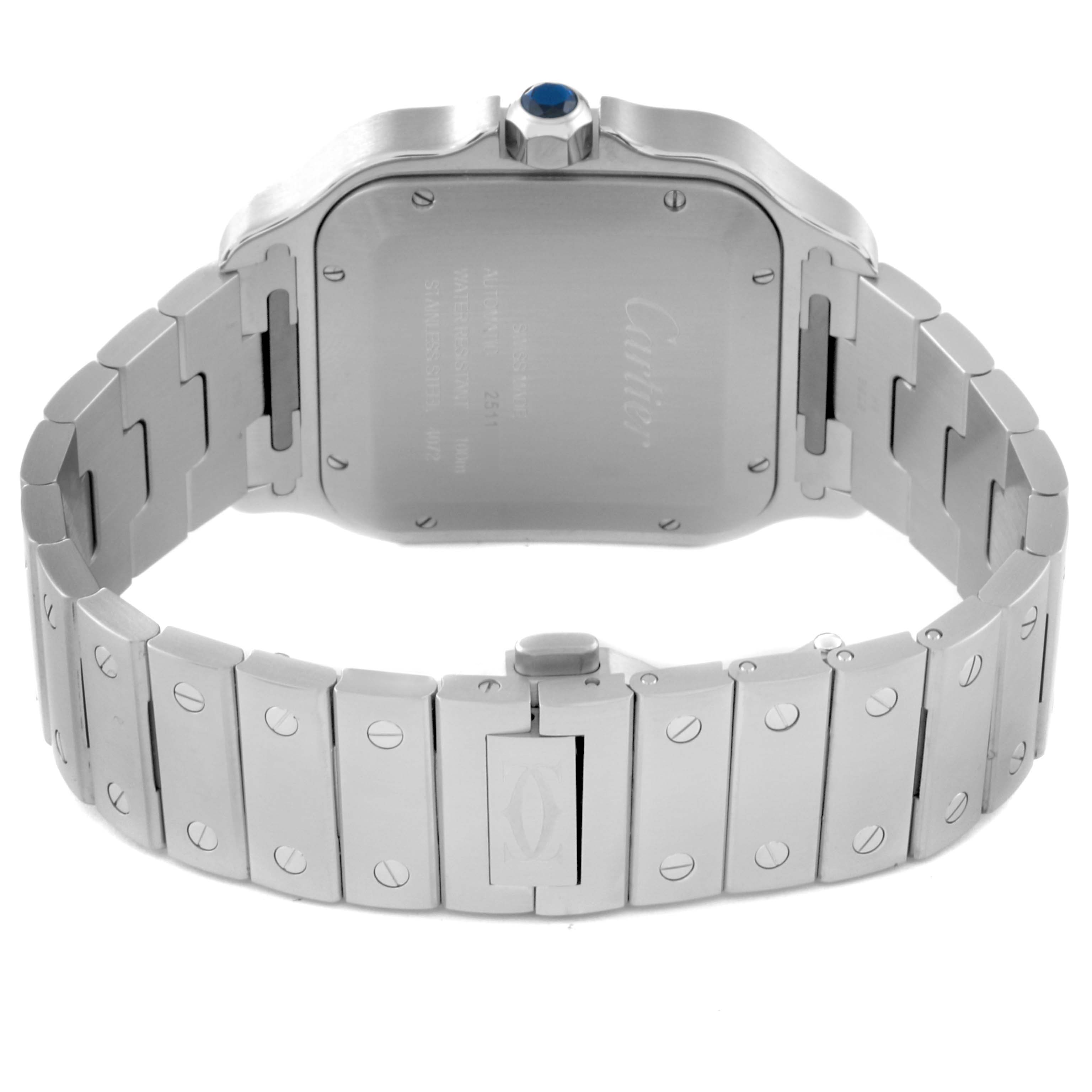 This image shows the back of the Santos model watch by Cartier, highlighting the case back and stainless steel bracelet with screws.