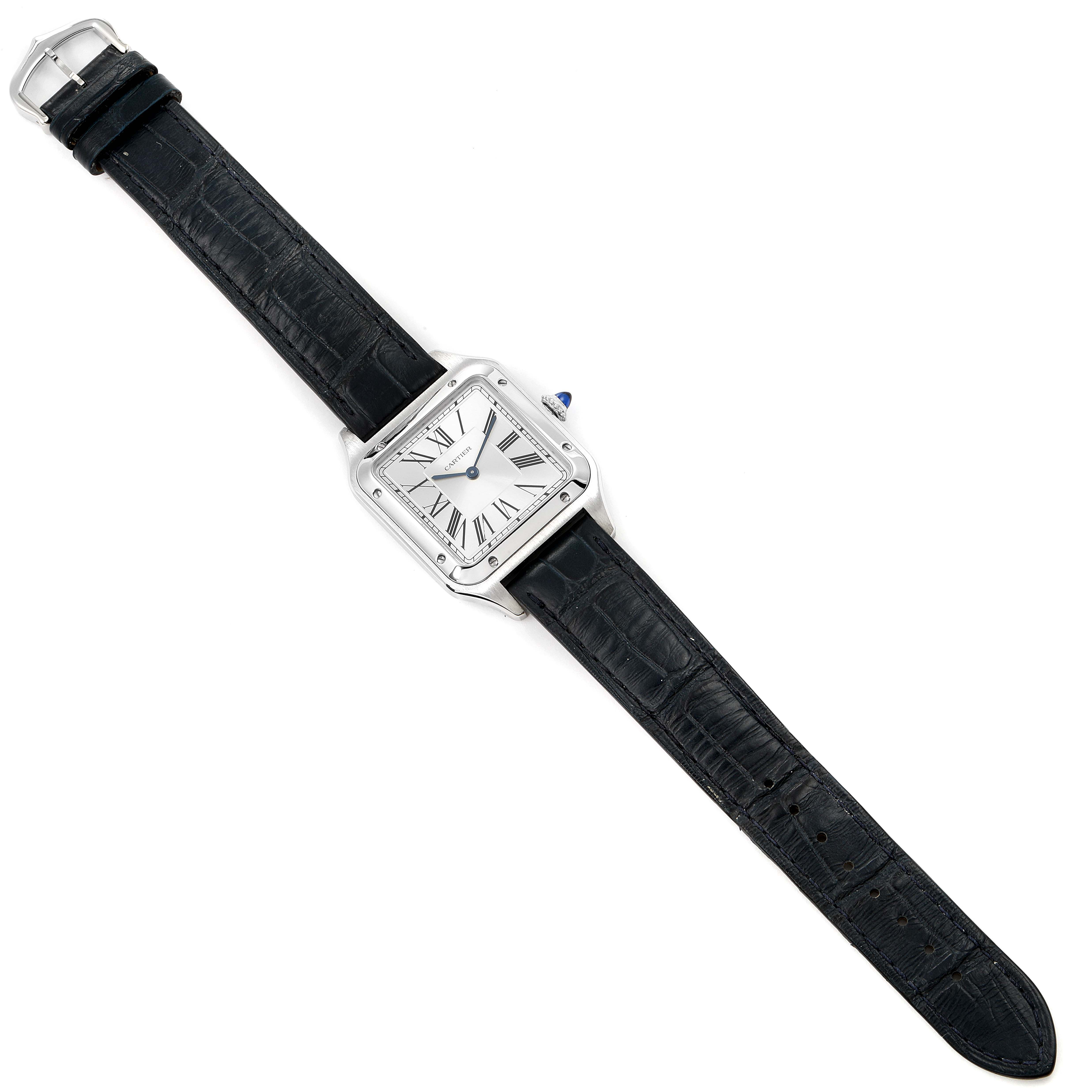The image shows a Cartier Santos Dumont WSSA0022 Men's Stainless Steel Silver Dial WSSA0022 Men's Stainless Steel Silver Dial watch with a black leather strap, viewed from the top.