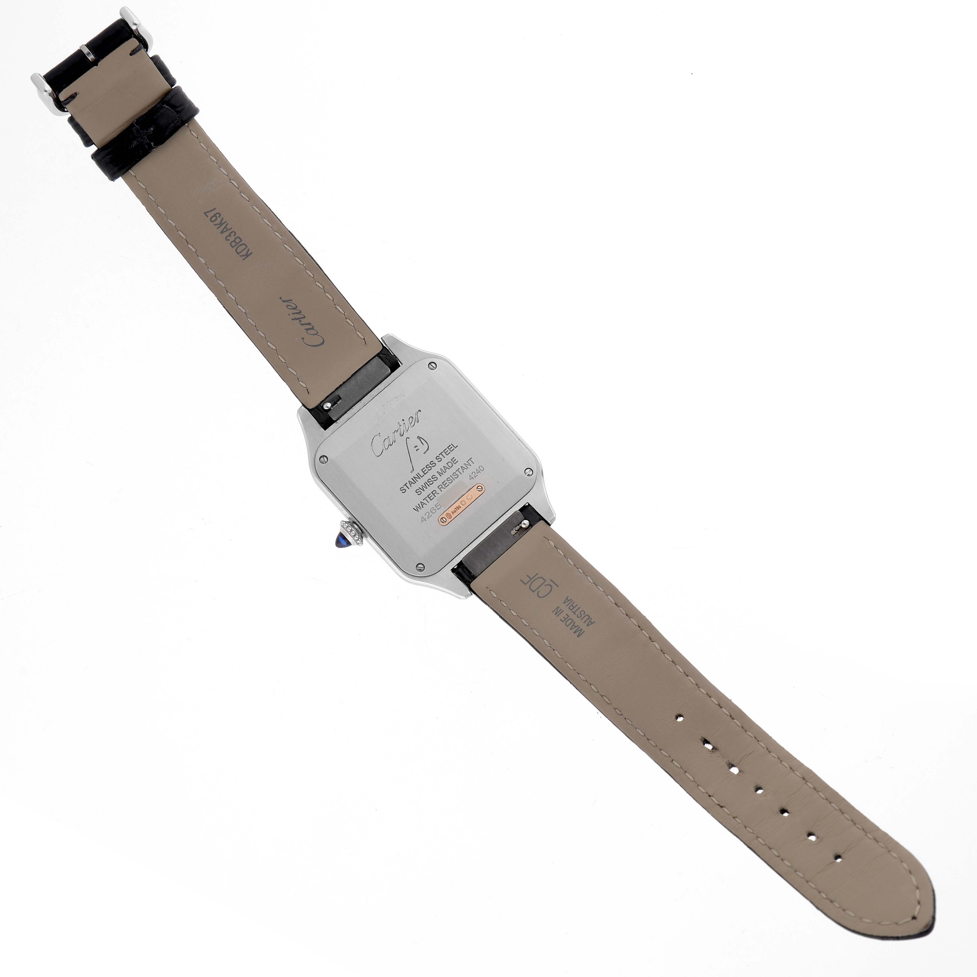 The image shows the backside of the Santos Dumont by Cartier, highlighting the case back, buckle, and leather straps.