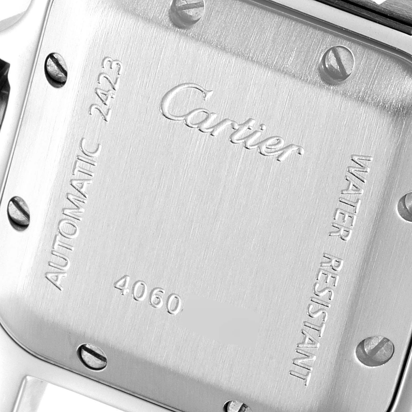 This image shows the back of the Santos model by Cartier, displaying the screws, engravings, and brushed metal texture.