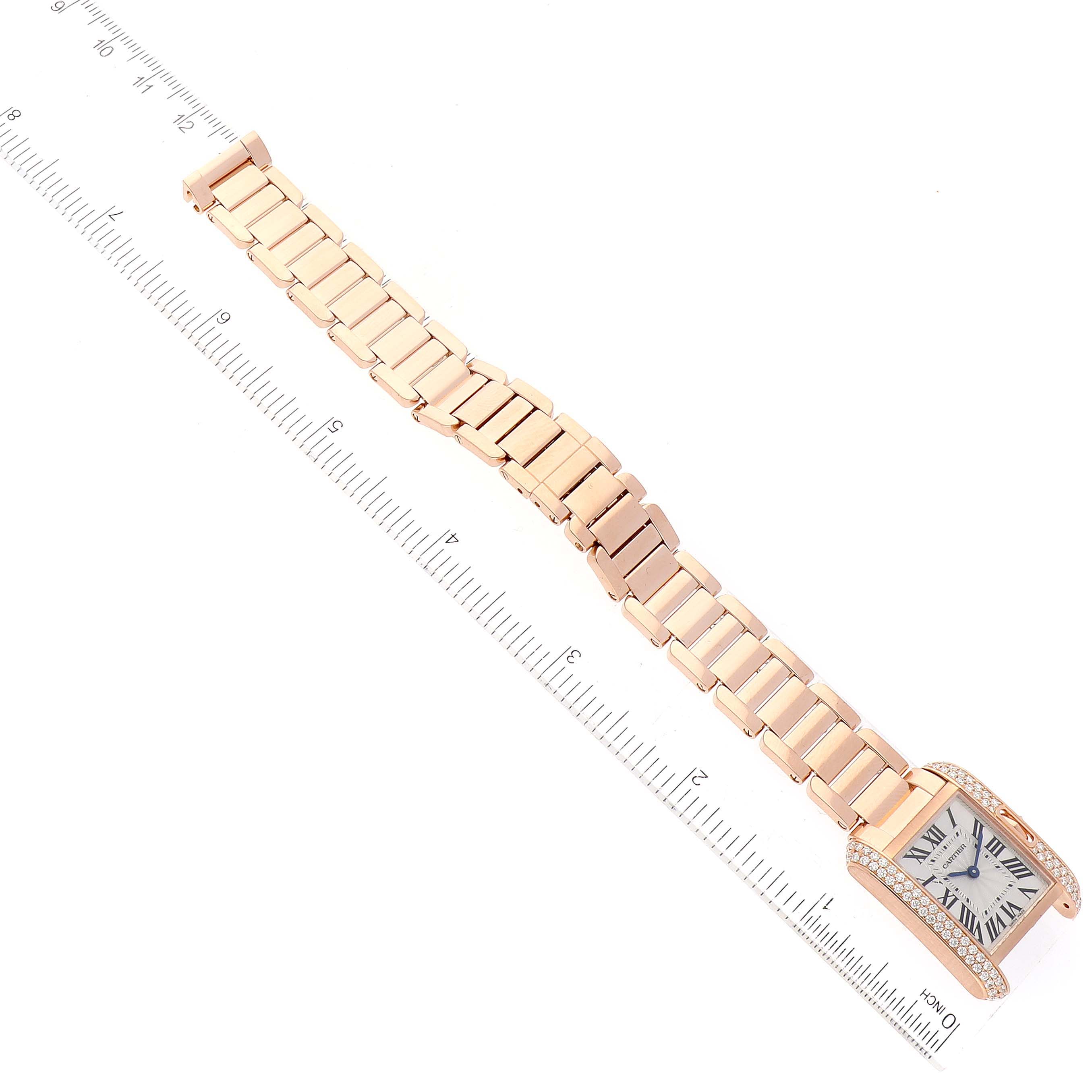 The image shows a Tank Anglaise model by Cartier, viewed from the top, highlighting the face, bracelet, and clasp.