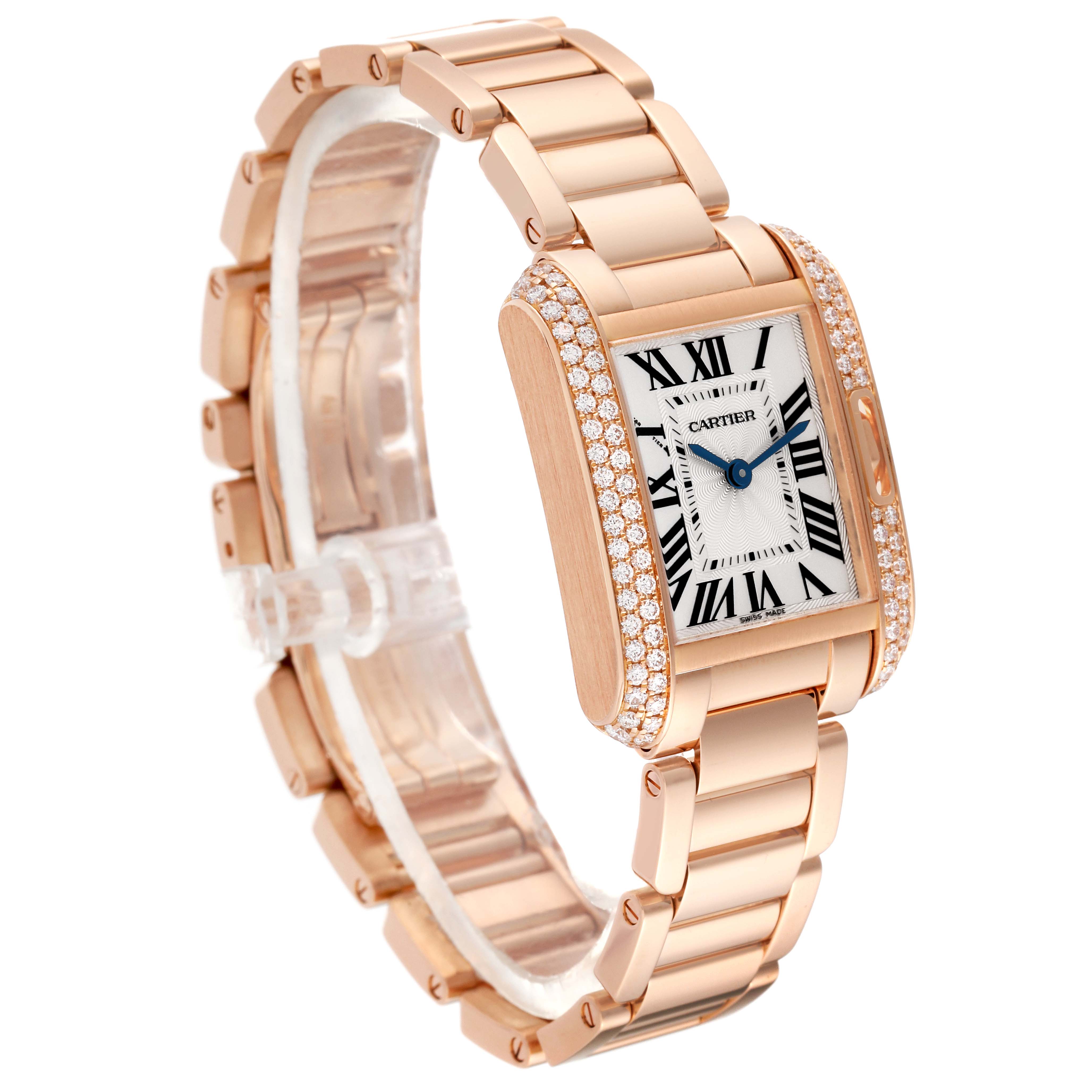 The image shows a Cartier Tank Anglaise WT100002 Women
s Rose Gold Silver Dial WT100002 Women
s Rose Gold Silver Dial watch with a rose gold bracelet and diamond-encrusted case from a three-quarter view angle.