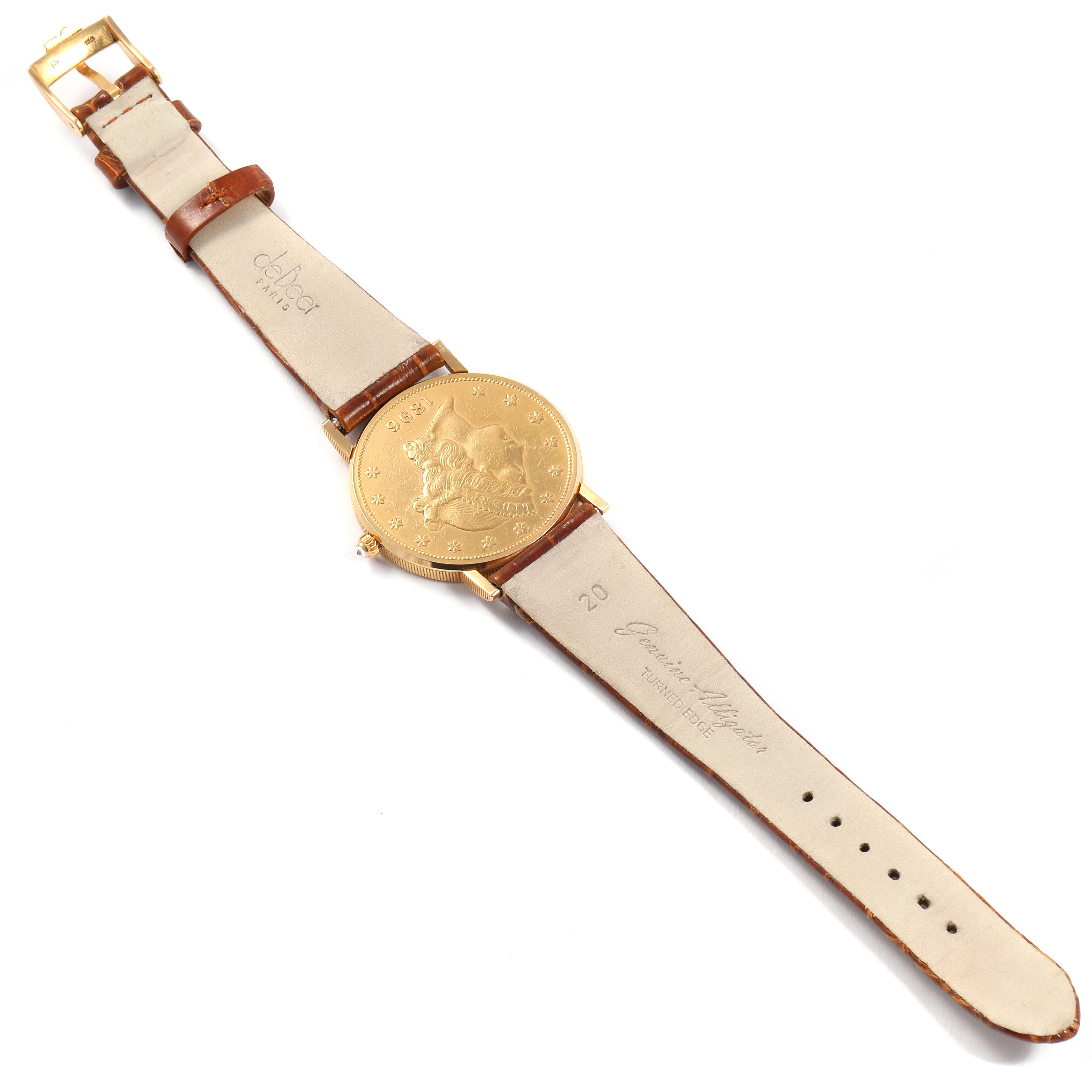 The image shows the back of the Corum  Women's Yellow Gold Black Dial  Women's Yellow Gold Black Dial Coin 20 Dollars Double Eagle Yellow Gold Men's Watch laid flat, displaying its brown strap and gold case.