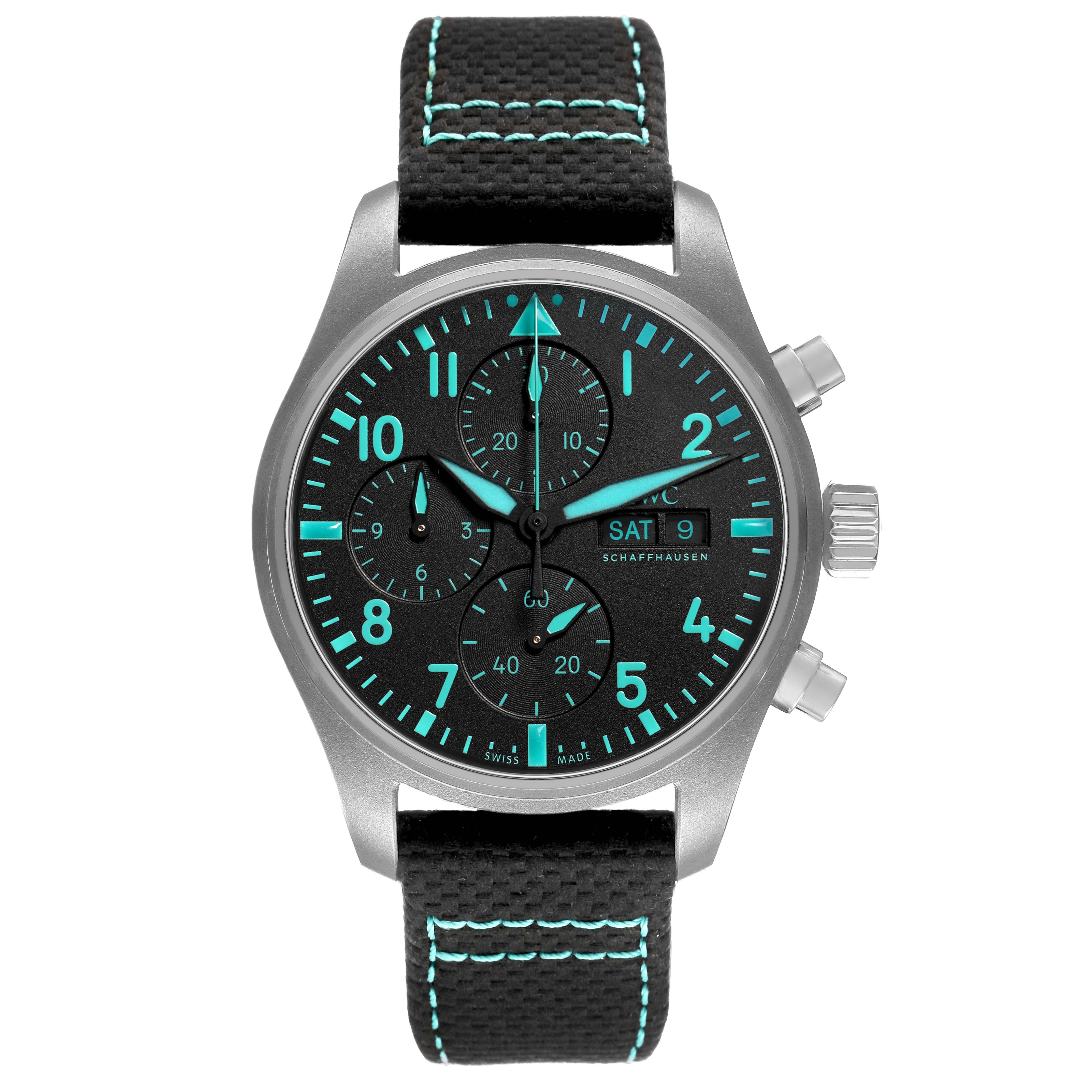 The IWC Pilot IW370607 Men's Titanium Black Dial model watch is shown from a front view, highlighting its face, subdials, luminous markers, and textile strap.