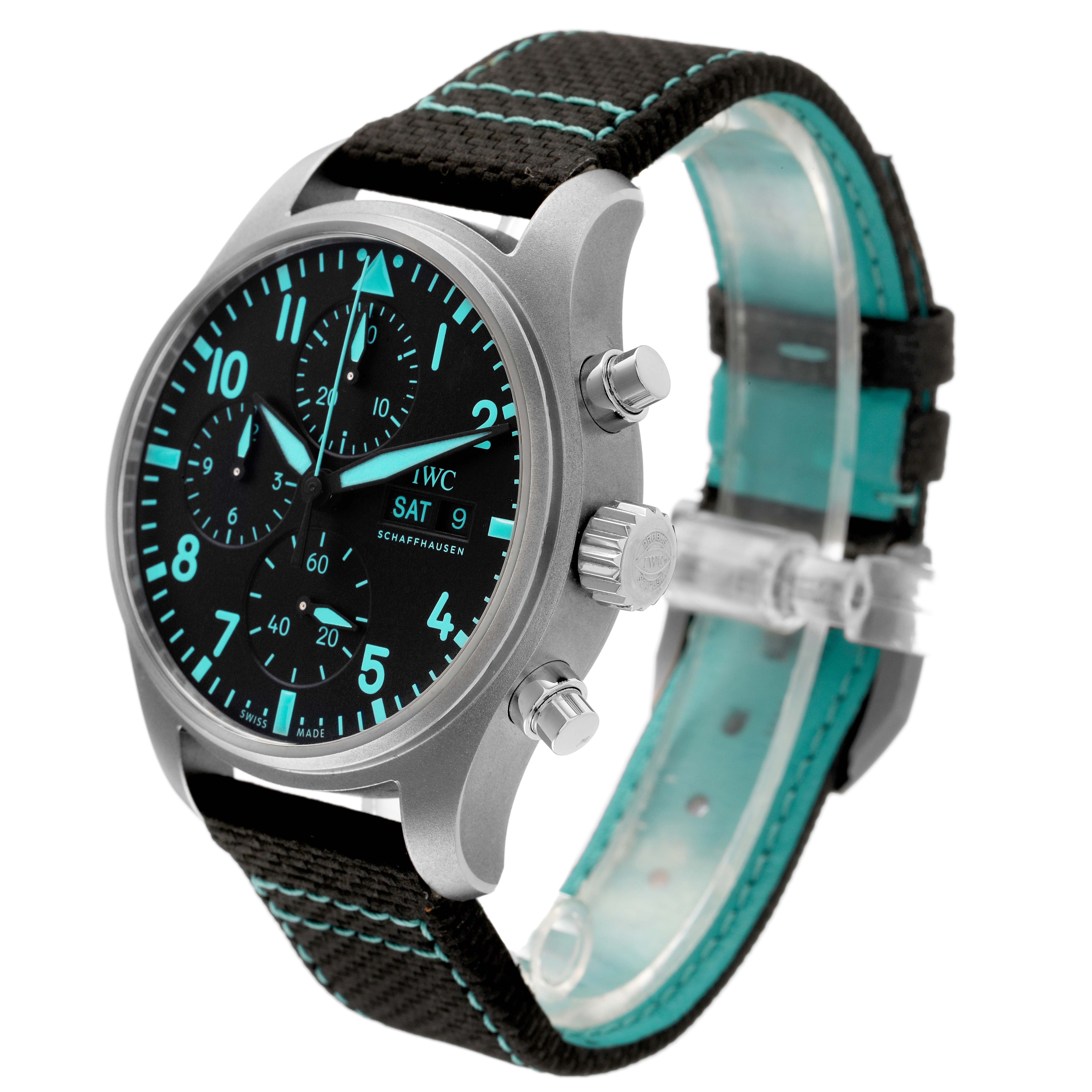 The IWC Pilot IW370607 Men's Titanium Black Dial watch is shown at a slight side angle, highlighting the dial, crown, pushers, and strap.