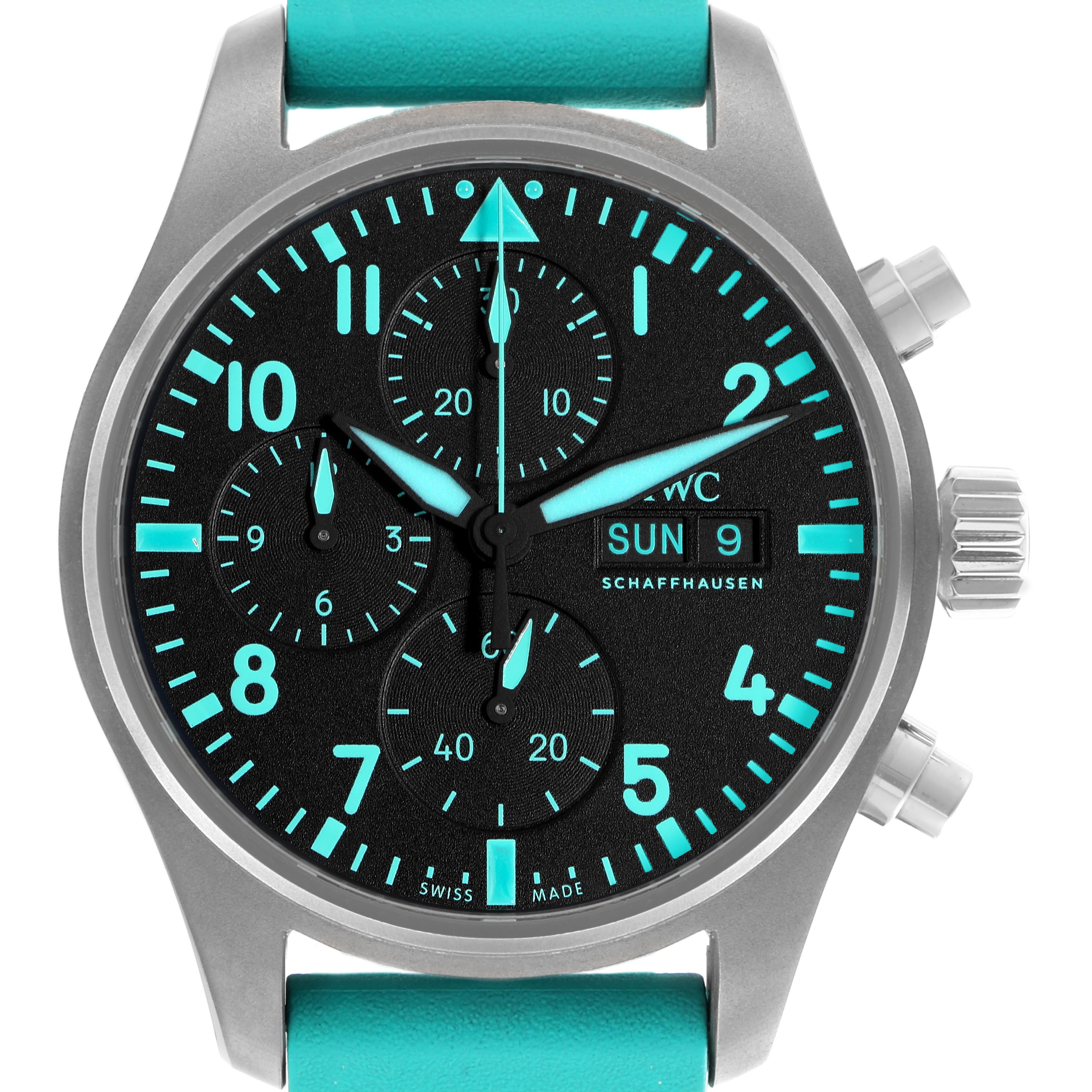 The IWC Pilot IW388108 Men's Titanium Black Dial IW388108 Men's Titanium Black Dial model watch is shown head-on, displaying the face, luminescent hands, subdials, crown, pushers, and strap.