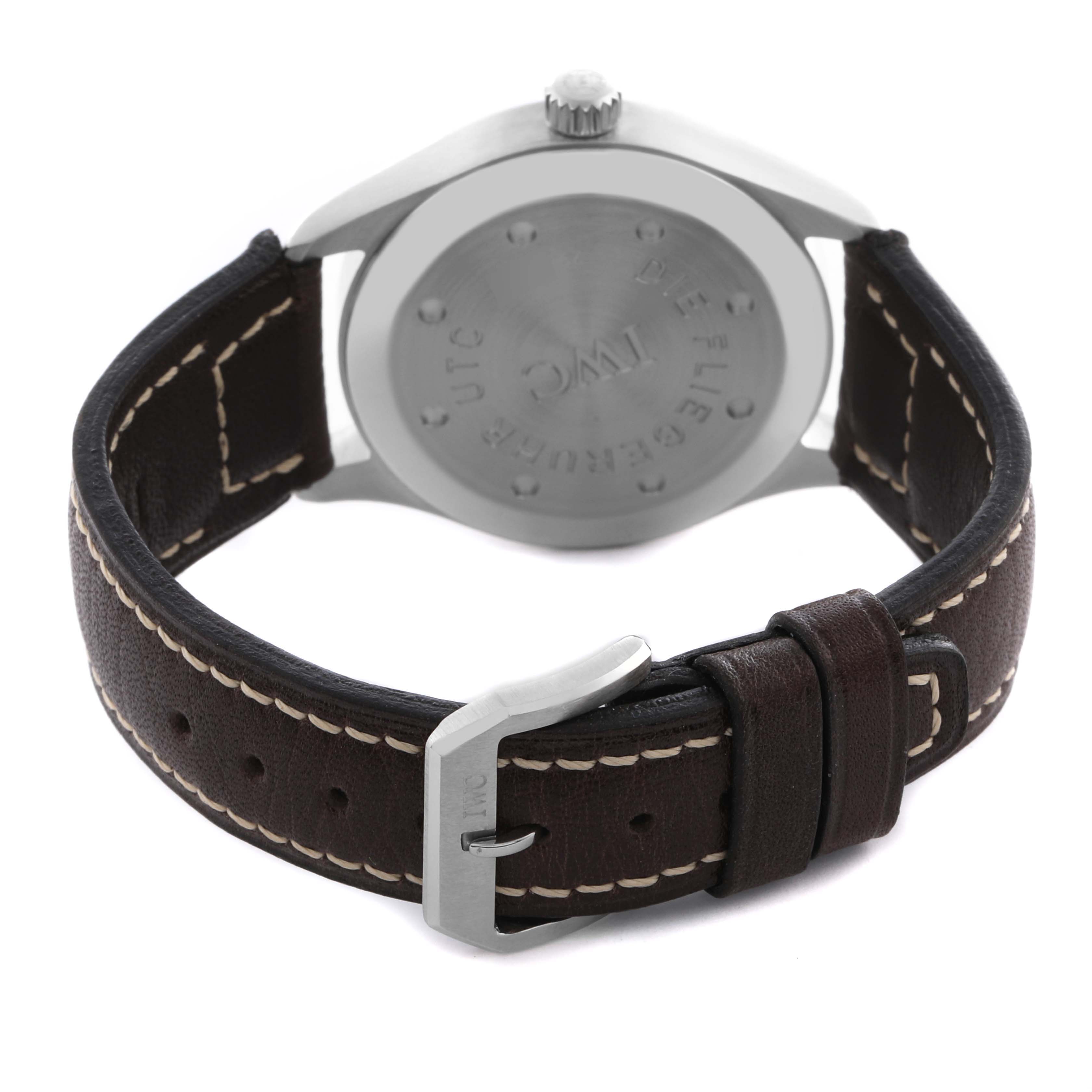 The image shows the back view of an IWC Pilot IW325105 Men's Stainless Steel Black Dial IW325105 Men's Stainless Steel Black Dial model watch, highlighting the case back and leather strap with a buckle.