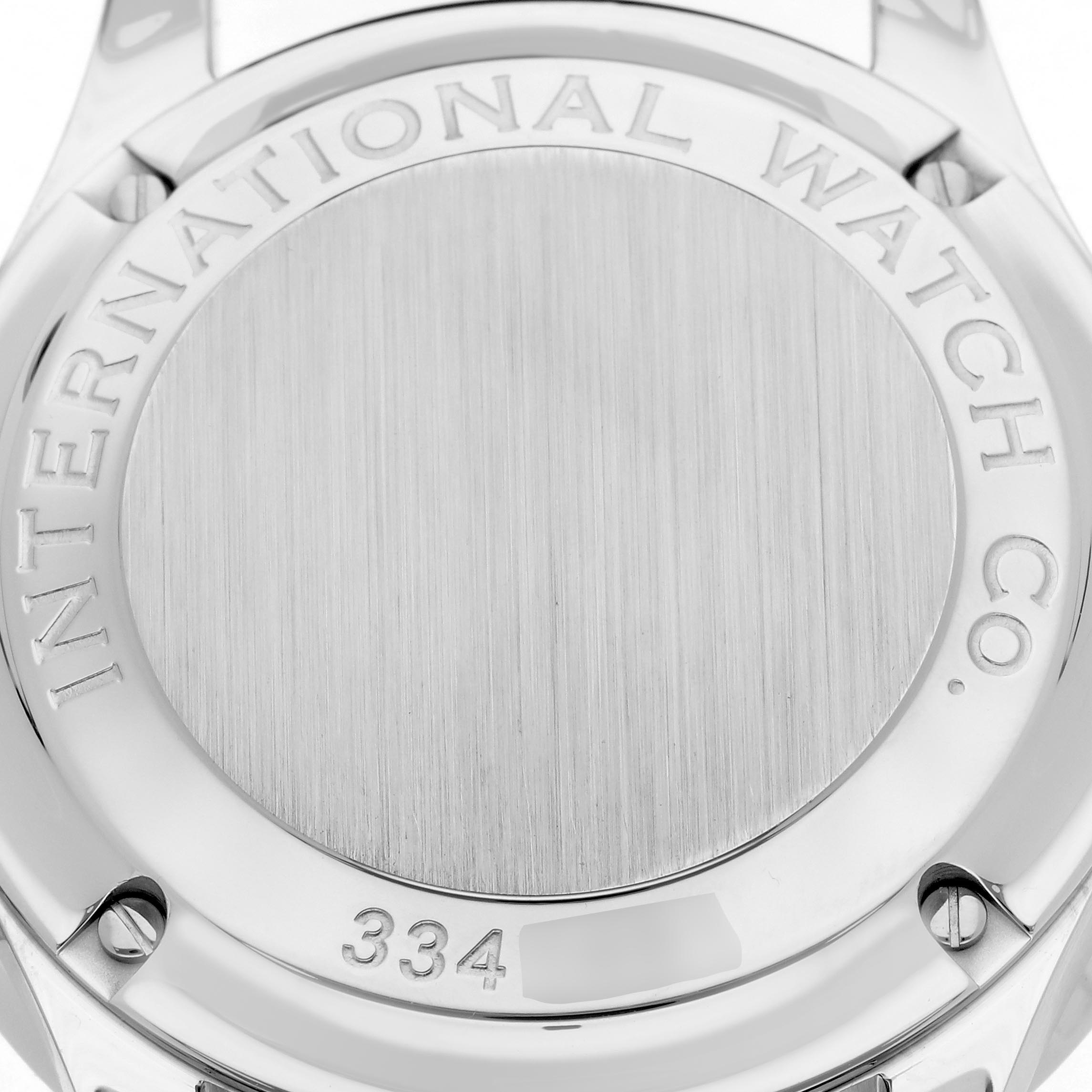 The image shows the back case of the IWC Portuguese IW371401 Men's Stainless Steel Silver Dial IW371401 Men's Stainless Steel Silver Dial model watch, displaying engraved branding and a polished finish.