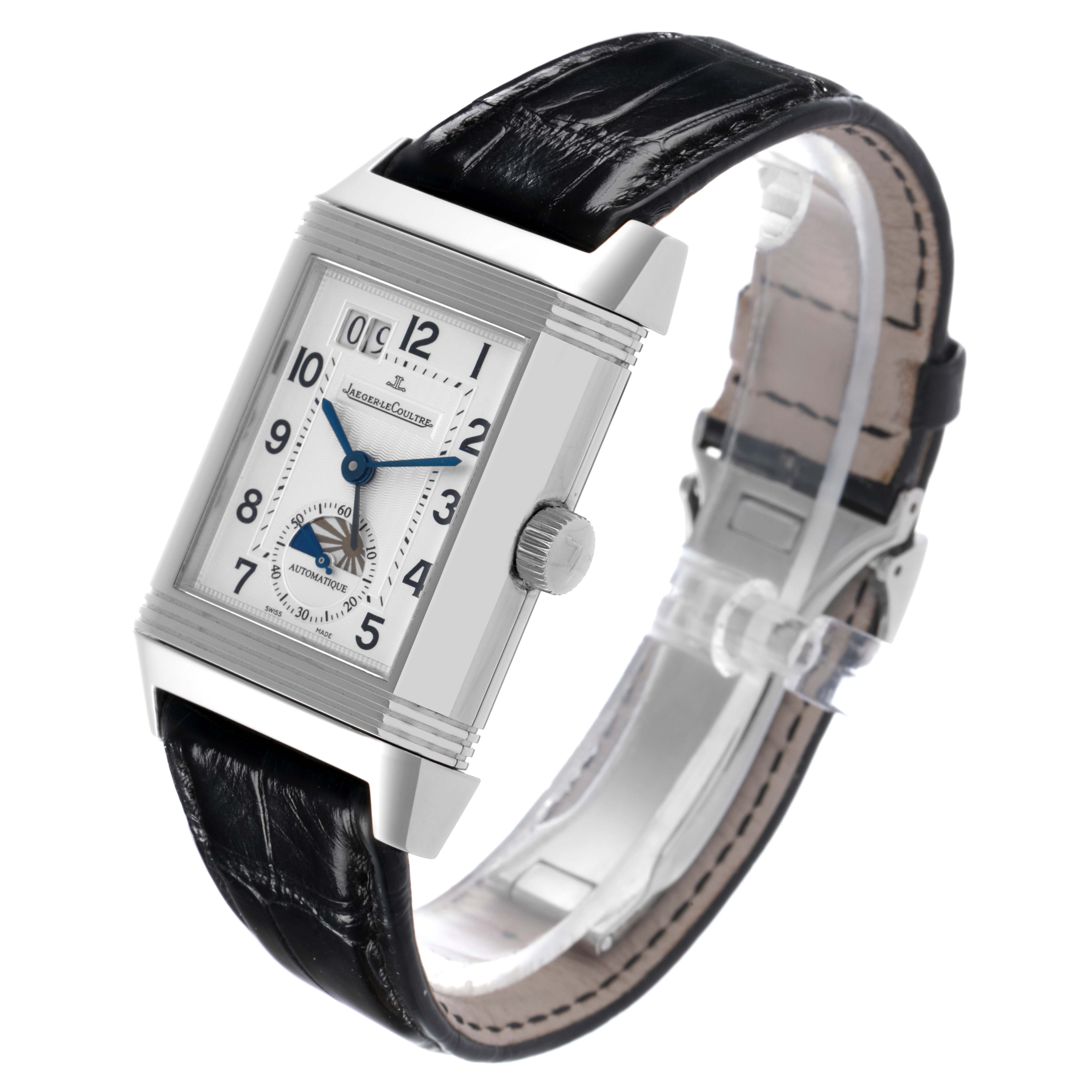 The Jaeger-LeCoultre Reverso watch is shown at a slight angle, featuring its face, crown, and black leather strap.