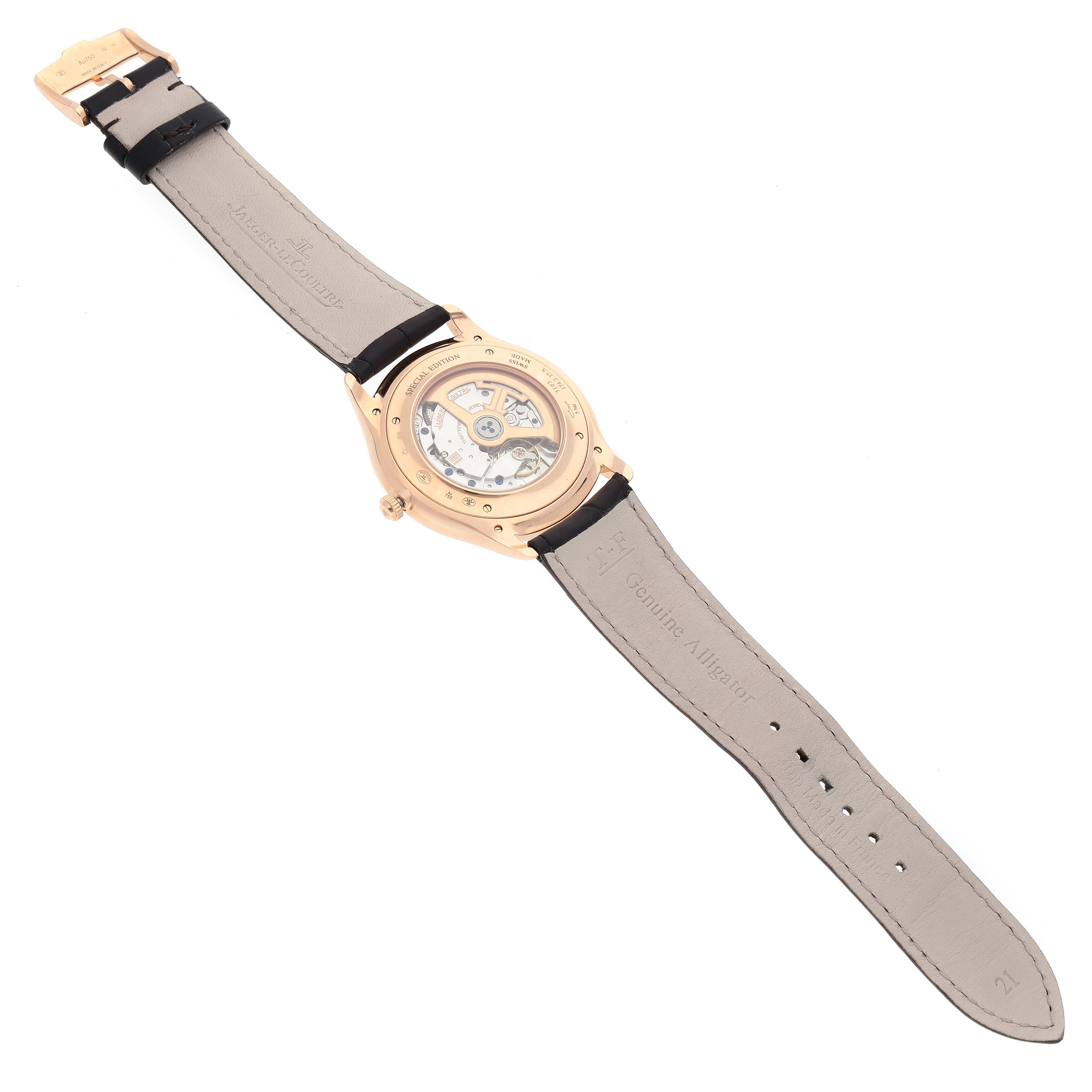 The image shows the back view of a Jaeger LeCoultre Master 174.2.37.S Men's Rose Gold Grey Dial 174.2.37.S Men's Rose Gold Grey Dial model watch, displaying its movement through a transparent case back.