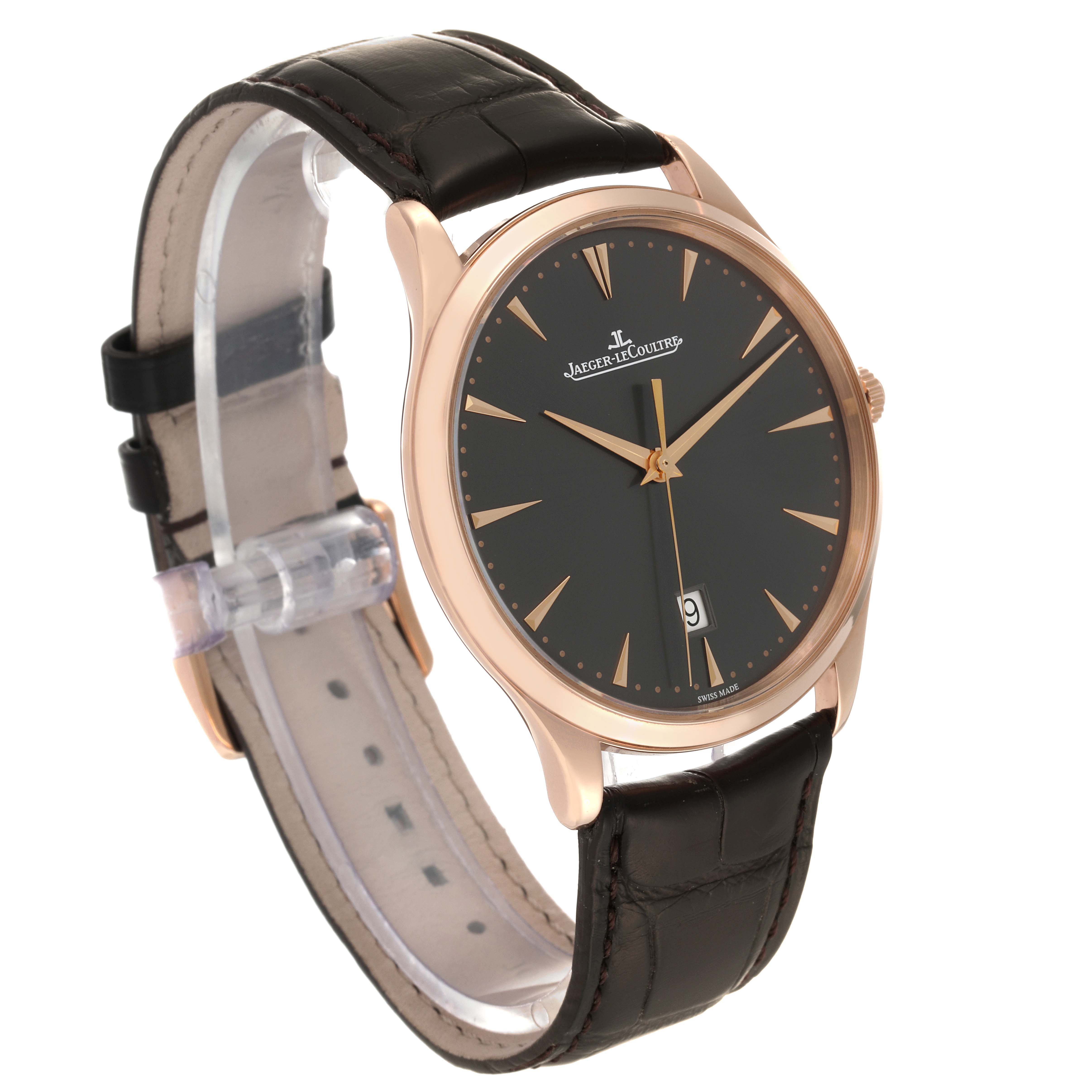 The image shows a side angle of the Jaeger-LeCoultre Master model watch, highlighting its dark dial, rose gold case, and leather strap.