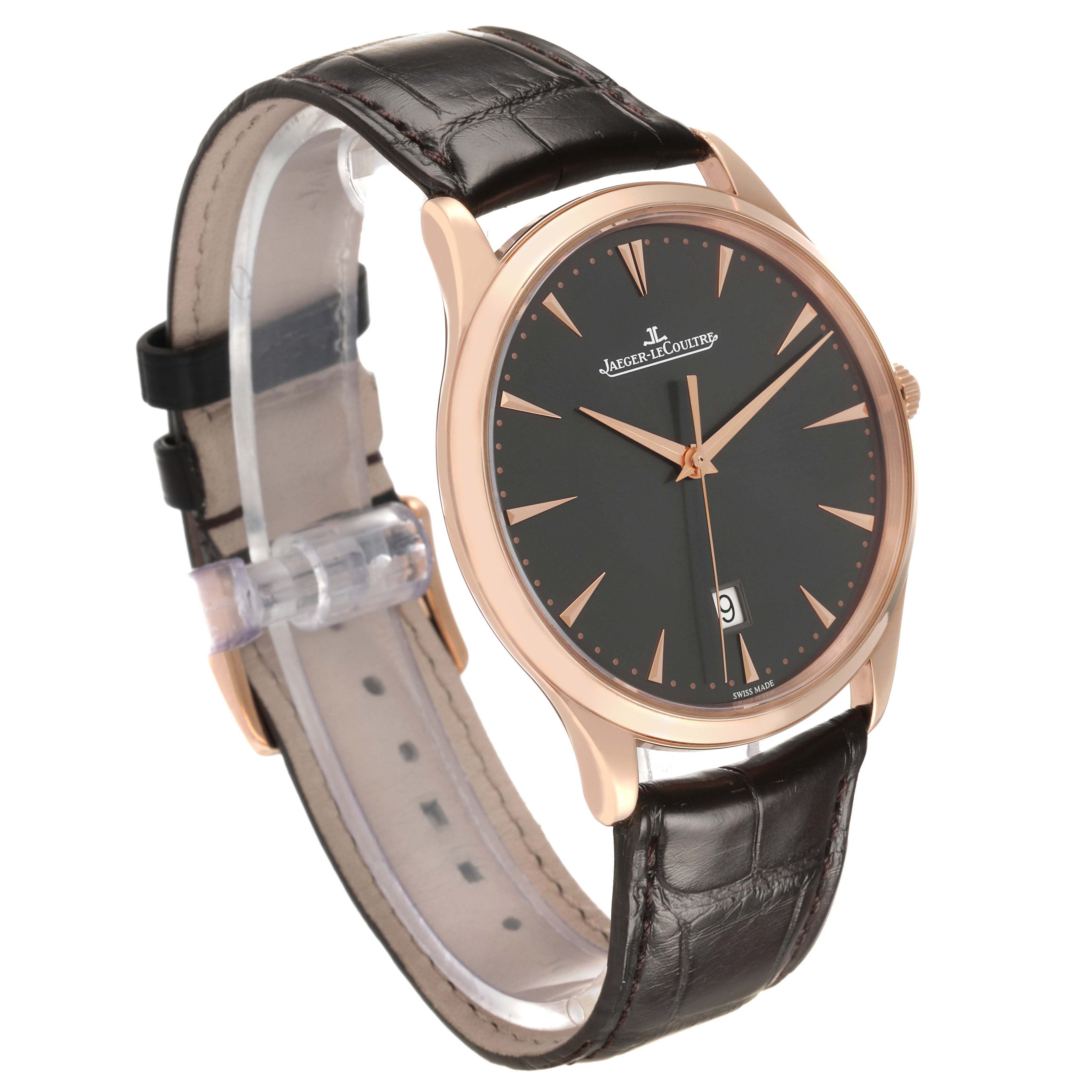 The Jaeger-LeCoultre Master watch is shown at a three-quarter angle, highlighting the dial, rose gold case, and brown leather strap.