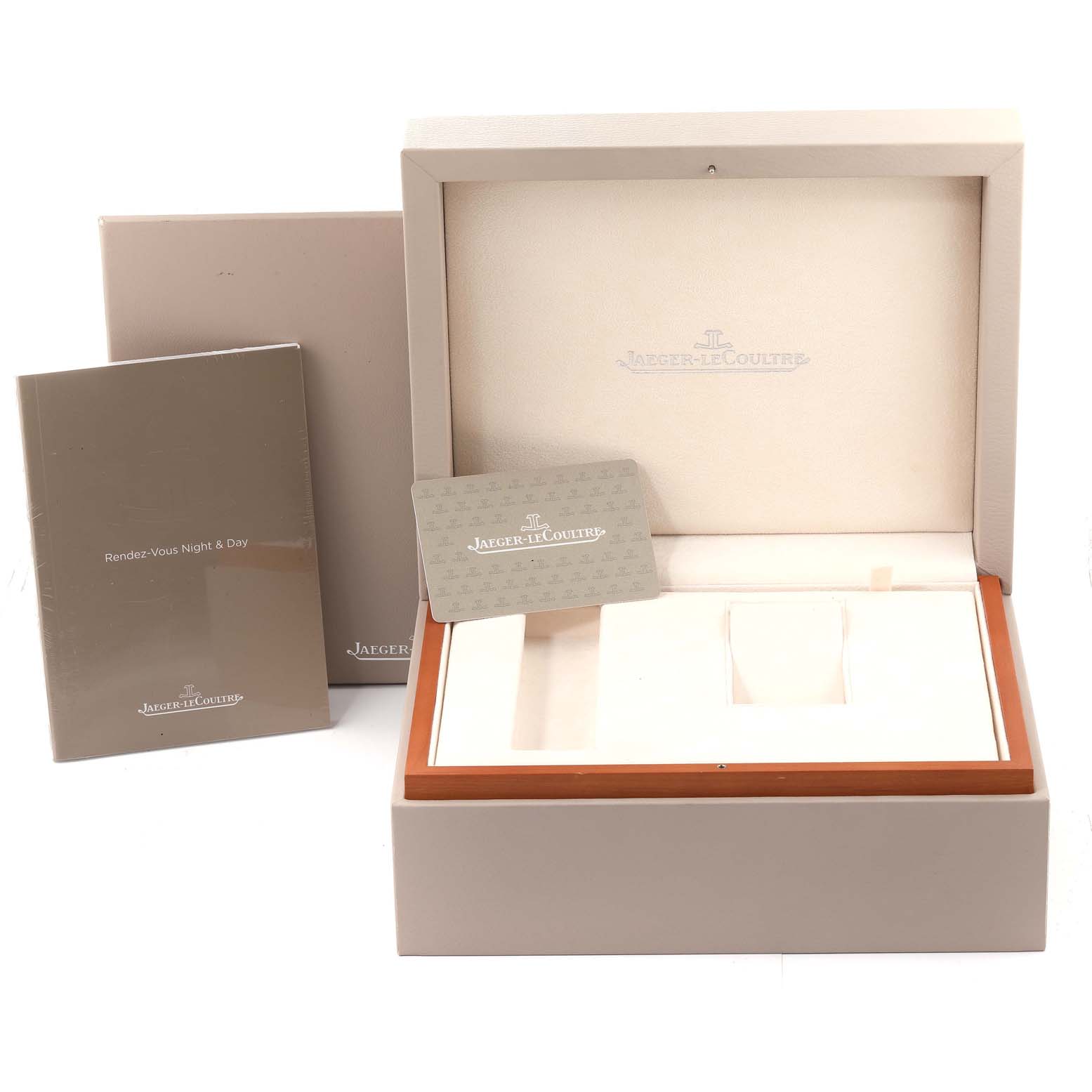 This image shows the packaging, manuals, and an empty watch box for the Jaeger-LeCoultre Master model.