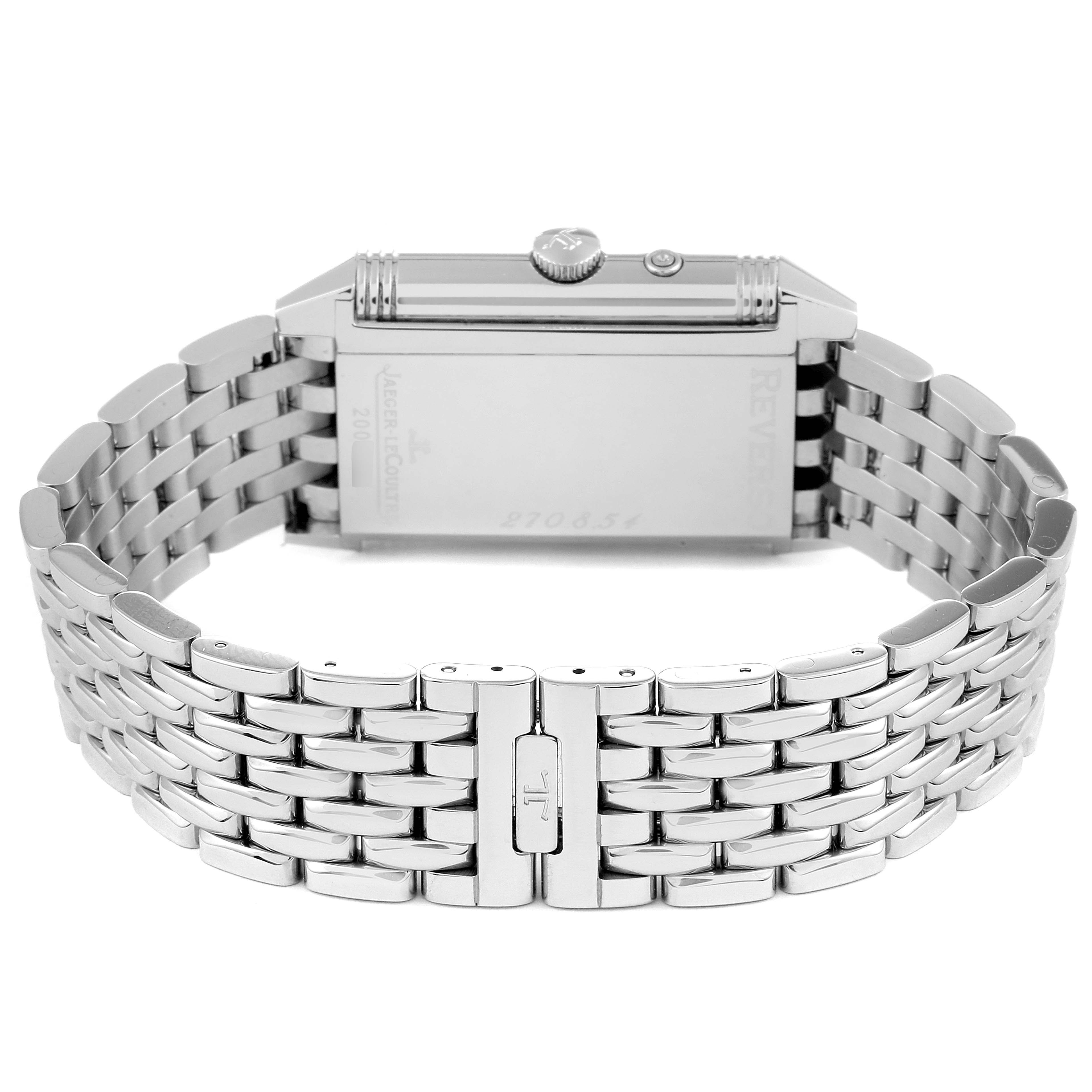 This image shows the back and side view of the Reverso model by Jaeger-LeCoultre, including its metallic strap and clasp.