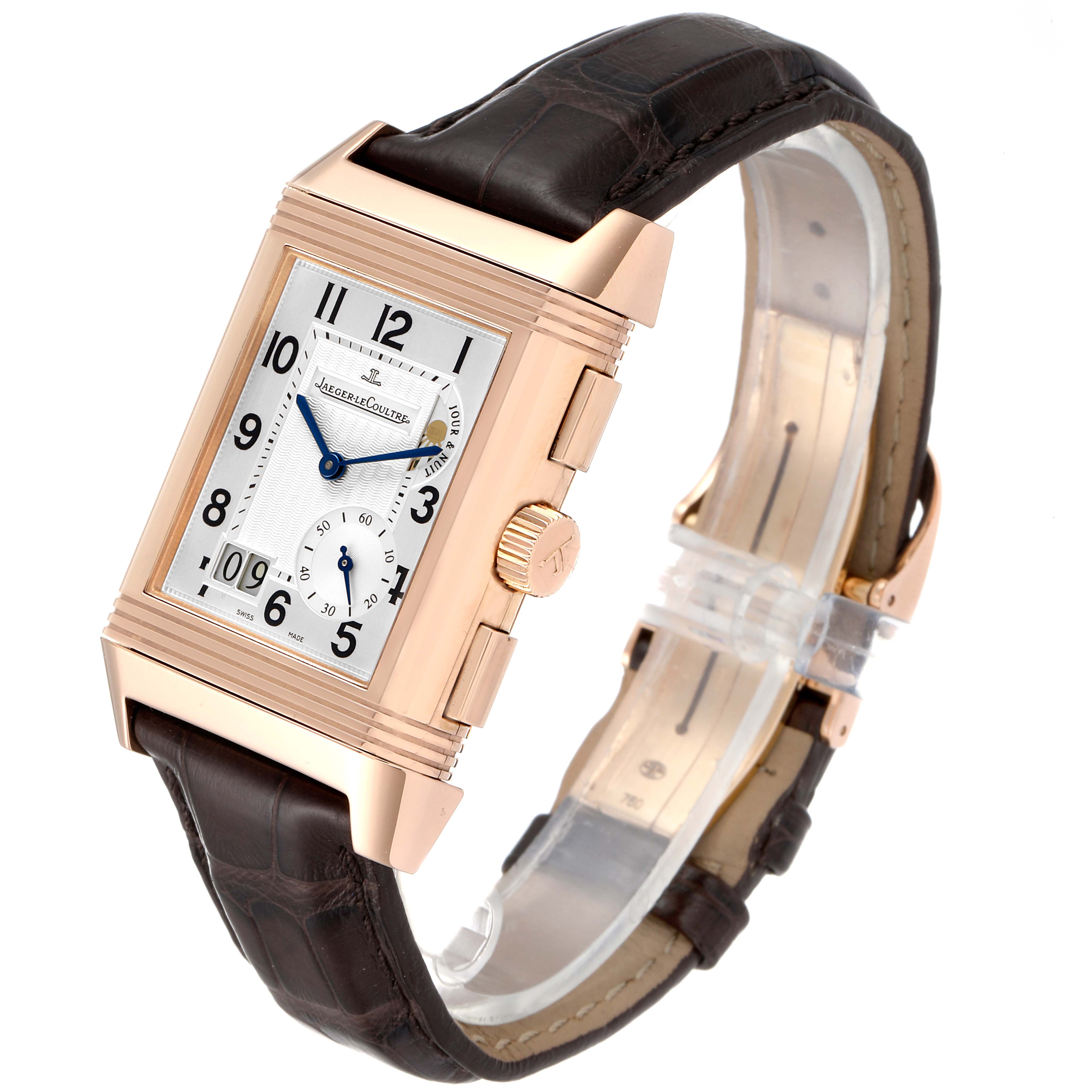 This image shows a Jaeger-LeCoultre Reverso watch at a slight angle, highlighting its rectangular face and brown leather strap.
