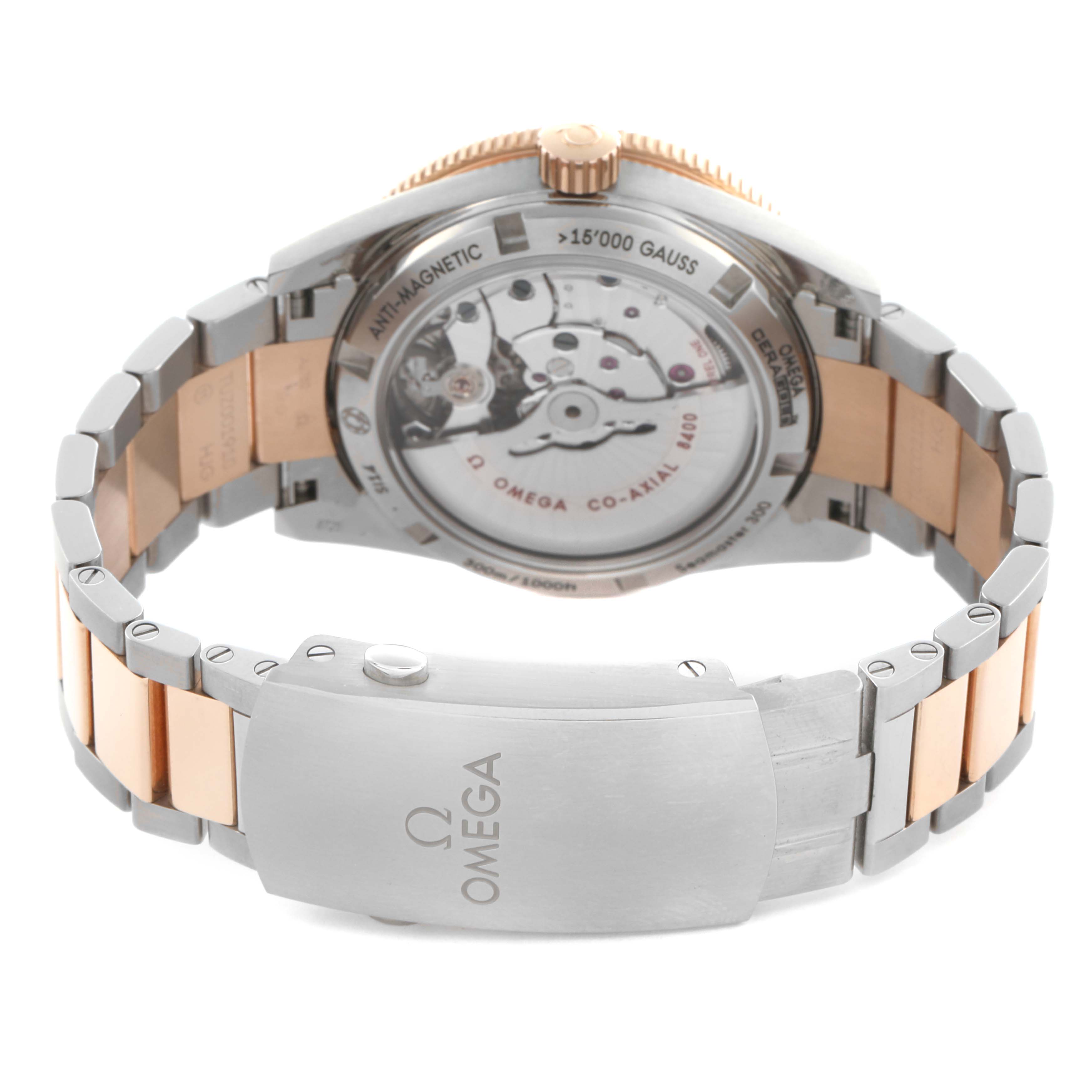 The Omega Seamaster 233.60.41.21.03.001 Men's Steel and Gold (two tone) Blue Dial 233.60.41.21.03.001 Men's Steel and Gold (two tone) Blue Dial watch is shown from the back, highlighting the movement and two-tone bracelet clasp.